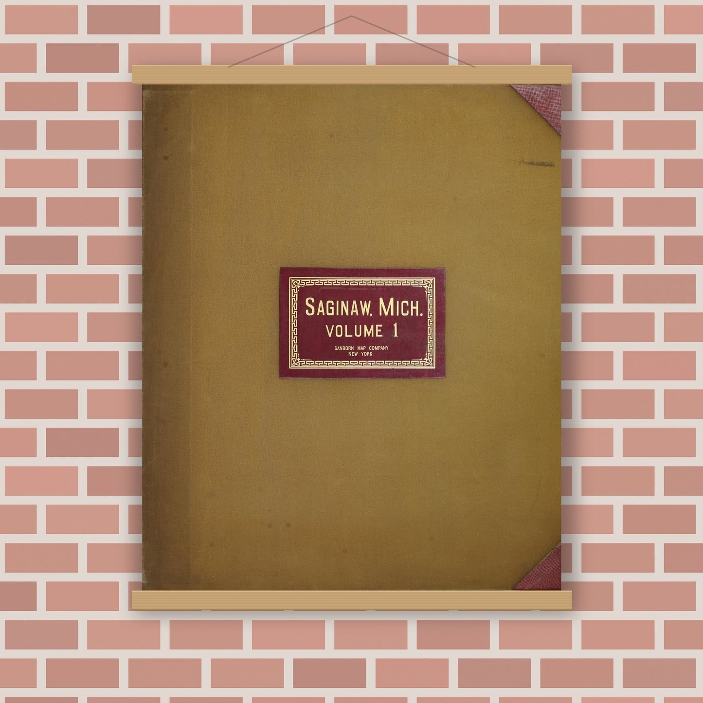 Old map wall art mockup — magnetic wood frame on brick wall — Sanborn Fire Insurance Map from Saginaw, Saginaw County, Michigan (1950), Sheet #0001
