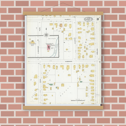 Old map wall art mockup — magnetic wood frame on brick wall — Sanborn Fire Insurance Map from Charlotte, Eaton County, Michigan (1904), Sheet #0008