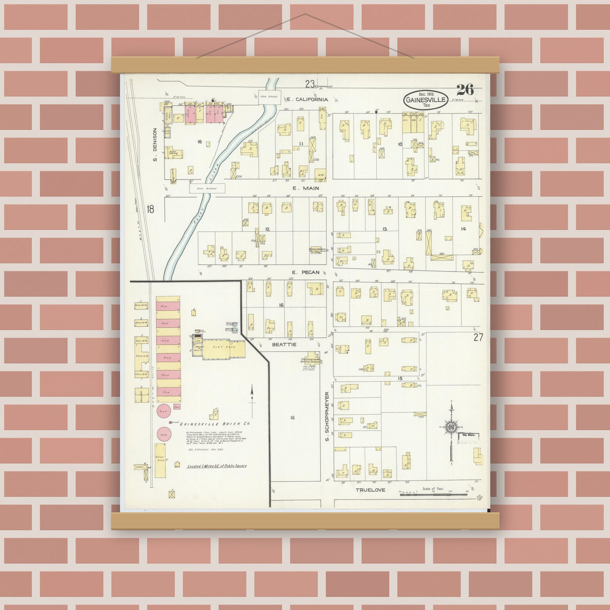 Old map wall art mockup — magnetic wood frame on brick wall — Sanborn Fire Insurance Map from Gainesville, Cooke County, Texas (1913), Sheet #0026