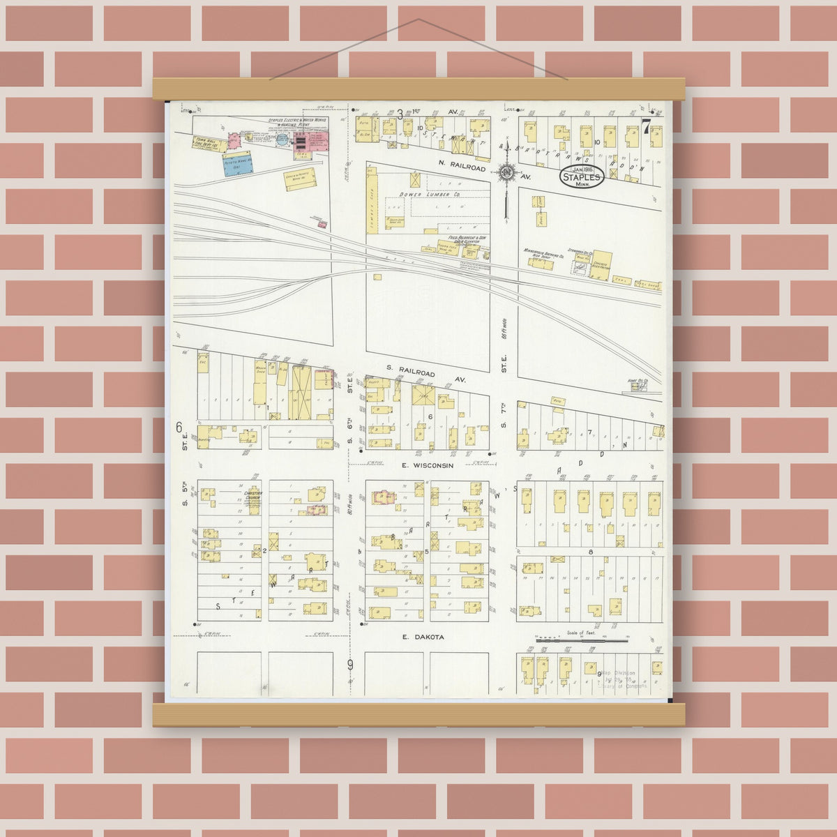 Old map wall art mockup — magnetic wood frame on brick wall — Sanborn Fire Insurance Map from Staples, Todd County, Minnesota (1916), Sheet #0007