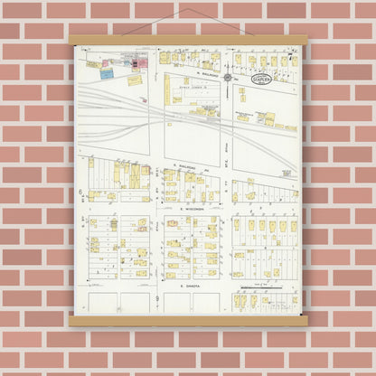 Old map wall art mockup — magnetic wood frame on brick wall — Sanborn Fire Insurance Map from Staples, Todd County, Minnesota (1916), Sheet #0007