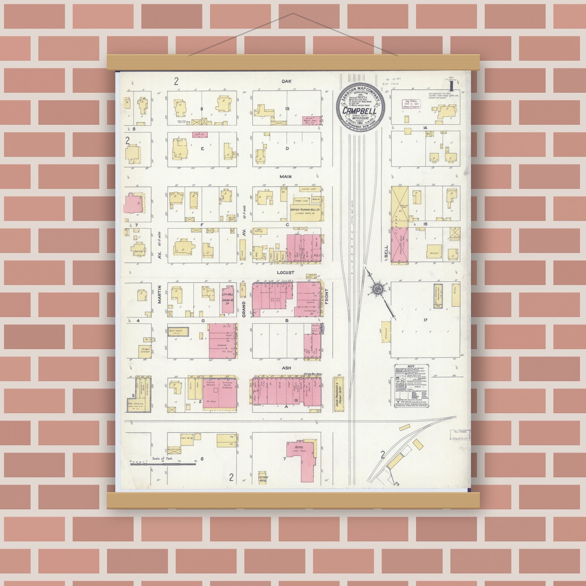 Old map wall art mockup — magnetic wood frame on brick wall — Sanborn Fire Insurance Map from Campbell, Dunklin County, Missouri (1911) - Complete Map Set
