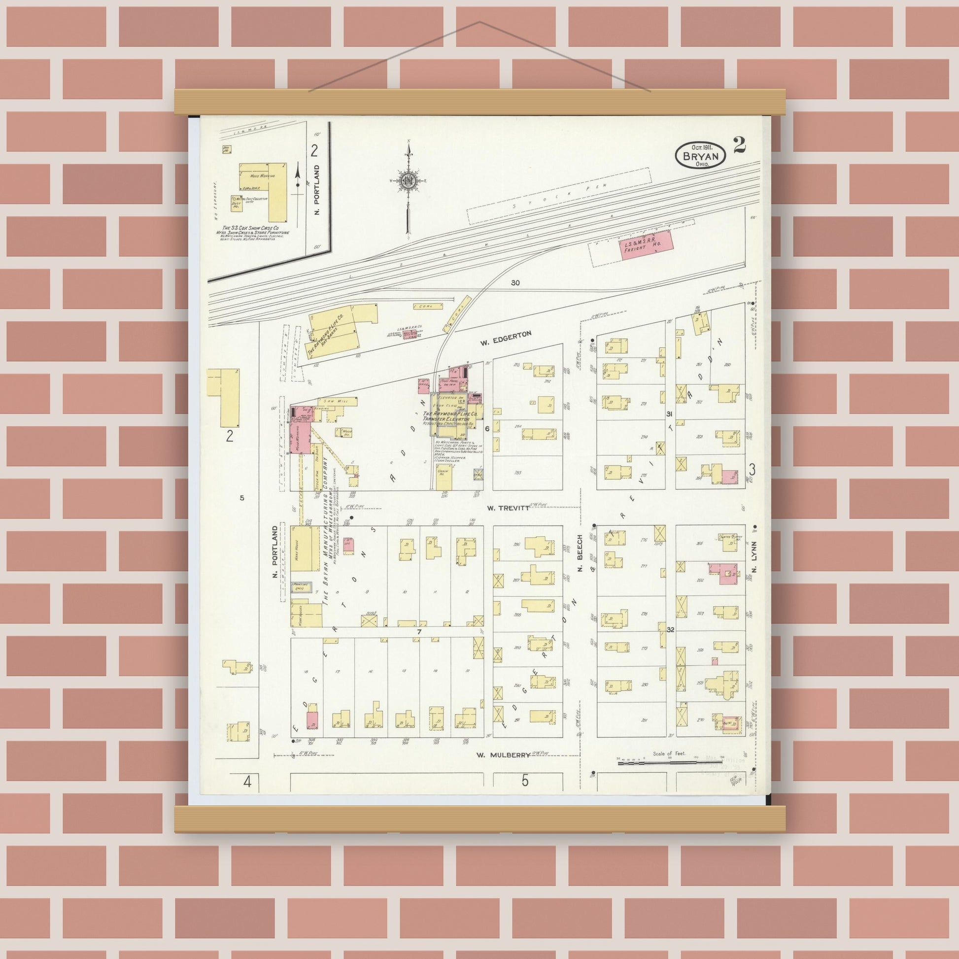 Old map wall art mockup — magnetic wood frame on brick wall — Sanborn Fire Insurance Map from Bryan, Williams County, Ohio (1911), Sheet #0002