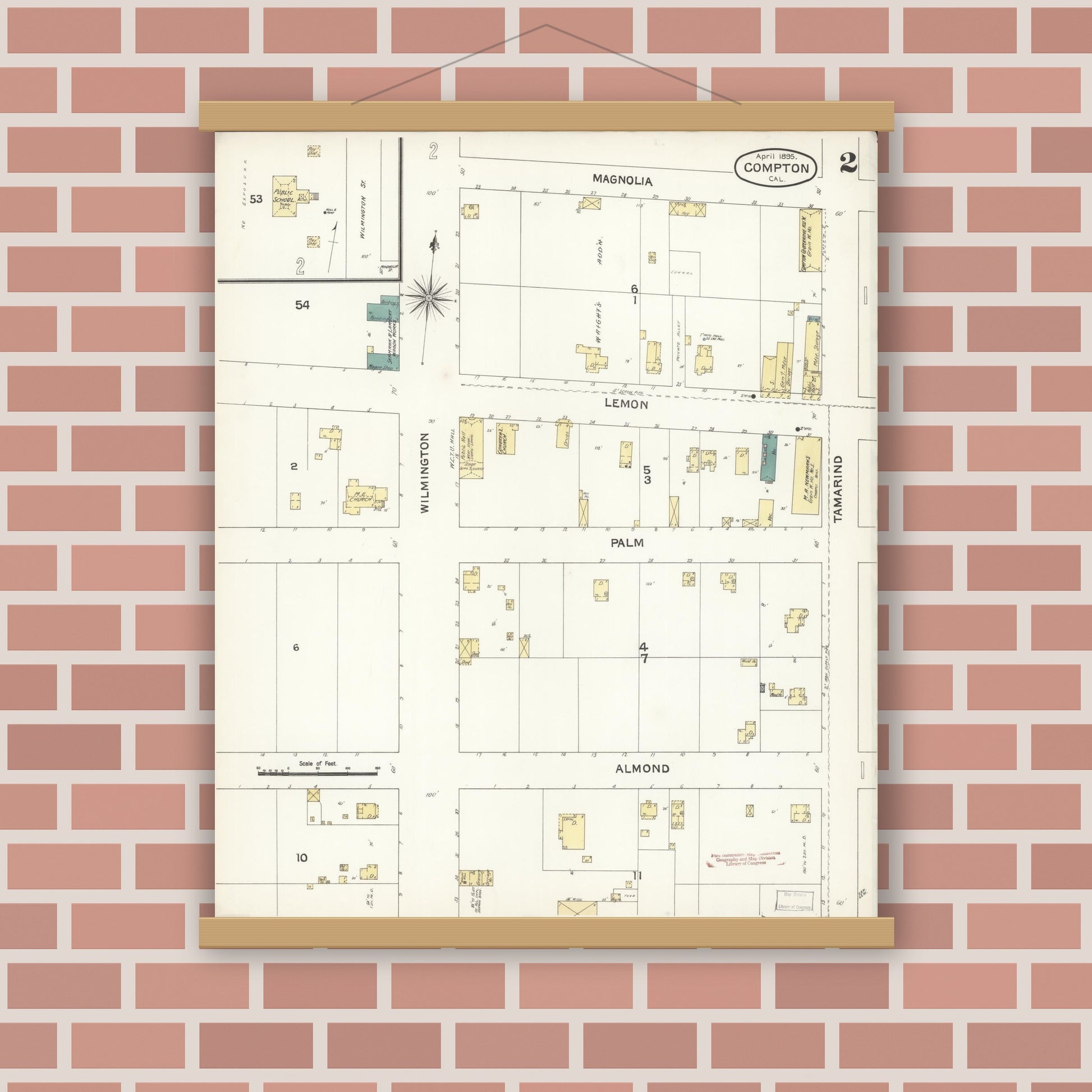 Old map wall art mockup — magnetic wood frame on brick wall — Sanborn Fire Insurance Map from Compton, Los Angeles County, California (1895), Sheet #0002
