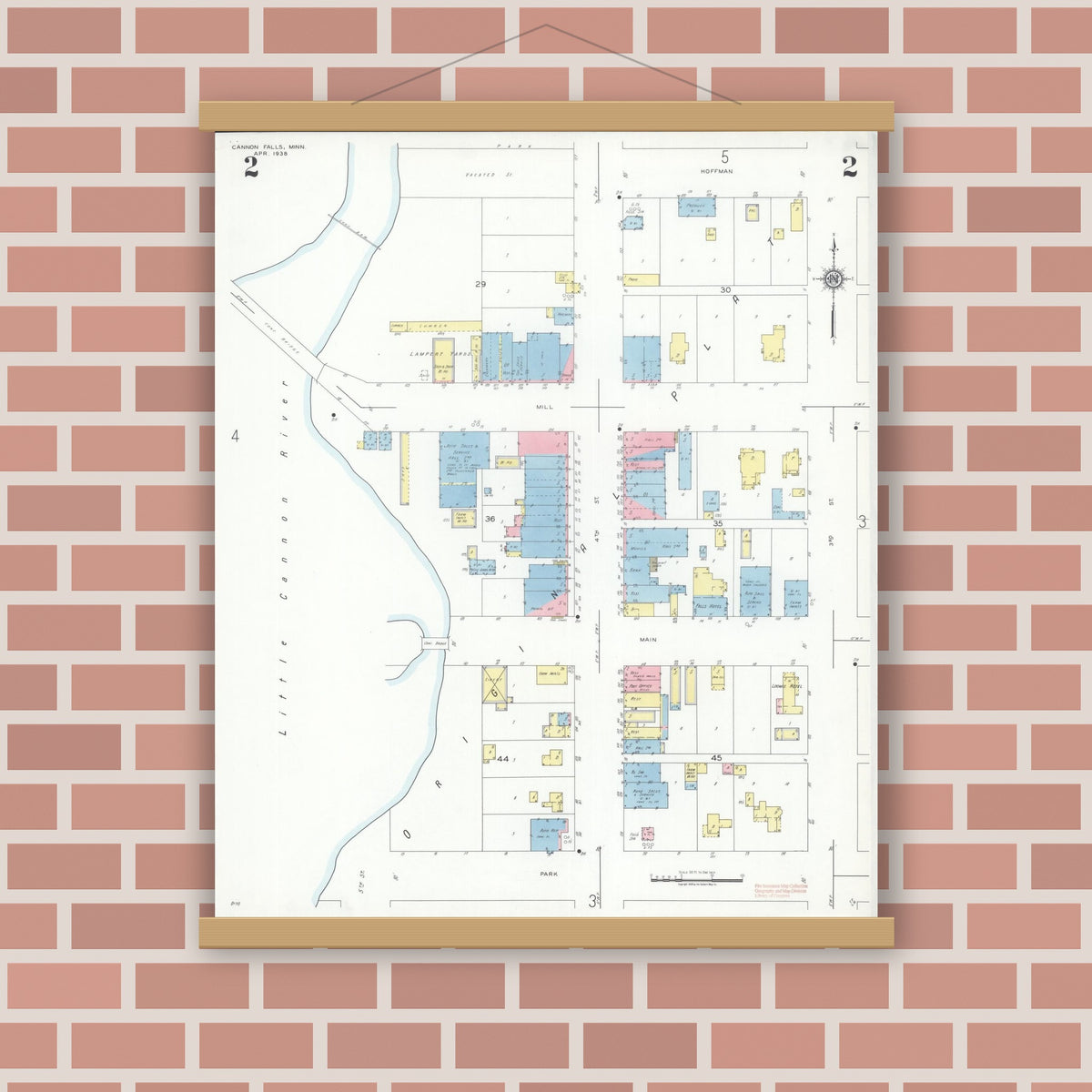 Old map wall art mockup — magnetic wood frame on brick wall — Sanborn Fire Insurance Map from Cannon Falls, Goodhue County, Minnesota (1938), Sheet #0002