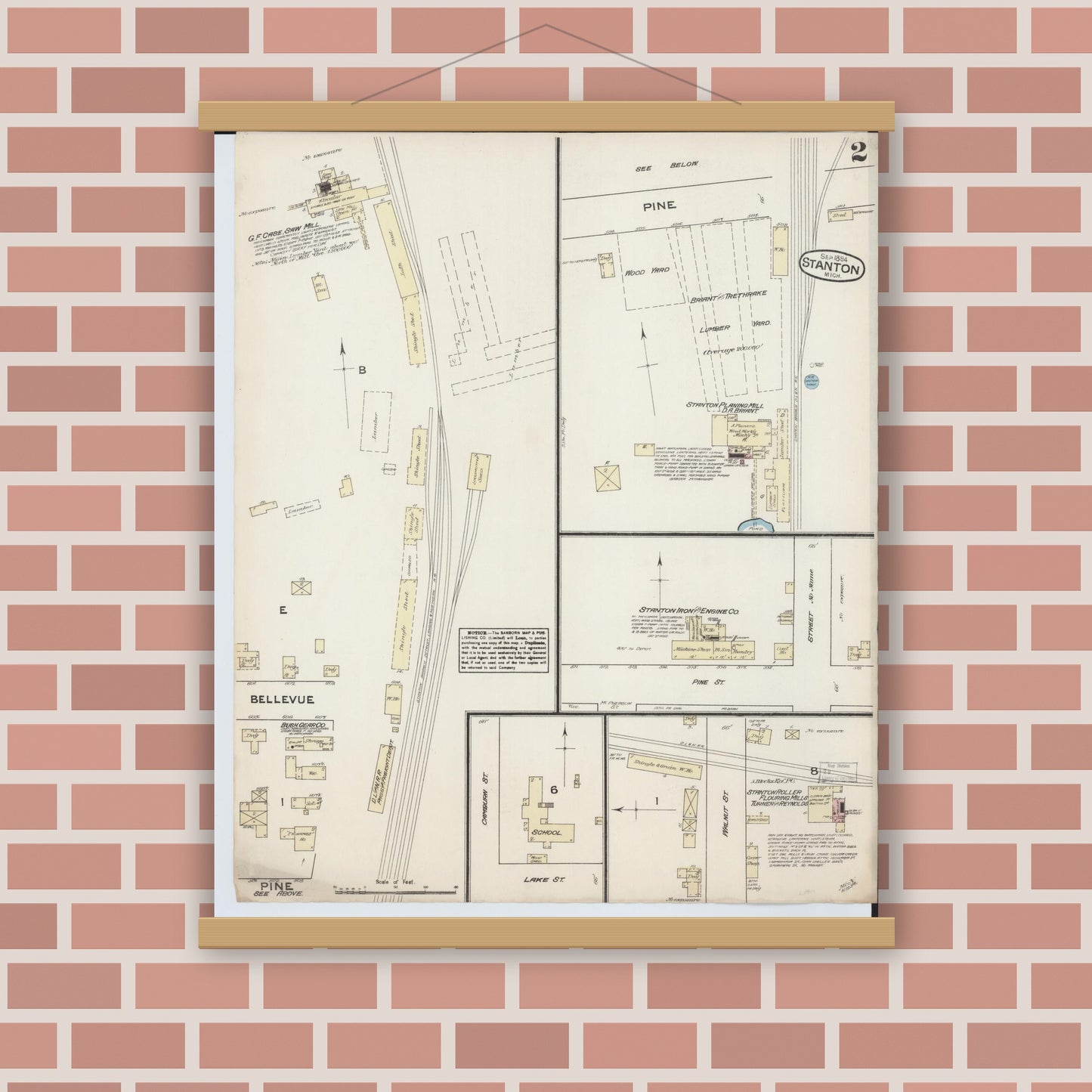 Old map wall art mockup — magnetic wood frame on brick wall — Sanborn Fire Insurance Map from Stanton, Montcalm County, Michigan (1884), Sheet #0002