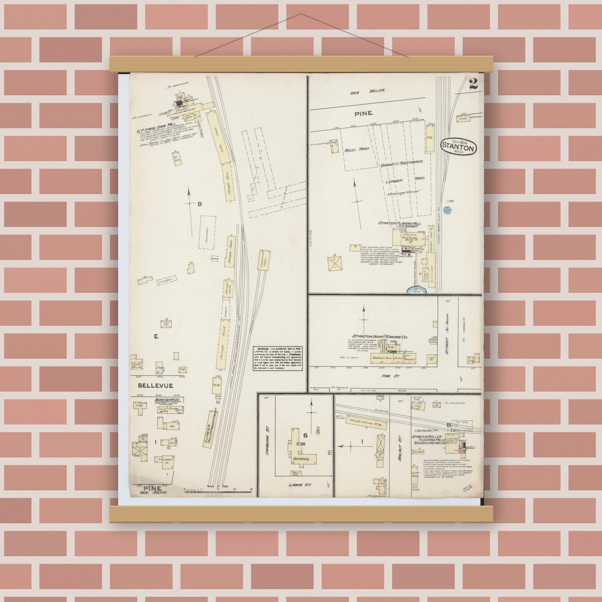 Old map wall art mockup — magnetic wood frame on brick wall — Sanborn Fire Insurance Map from Stanton, Montcalm County, Michigan (1884), Sheet #0002