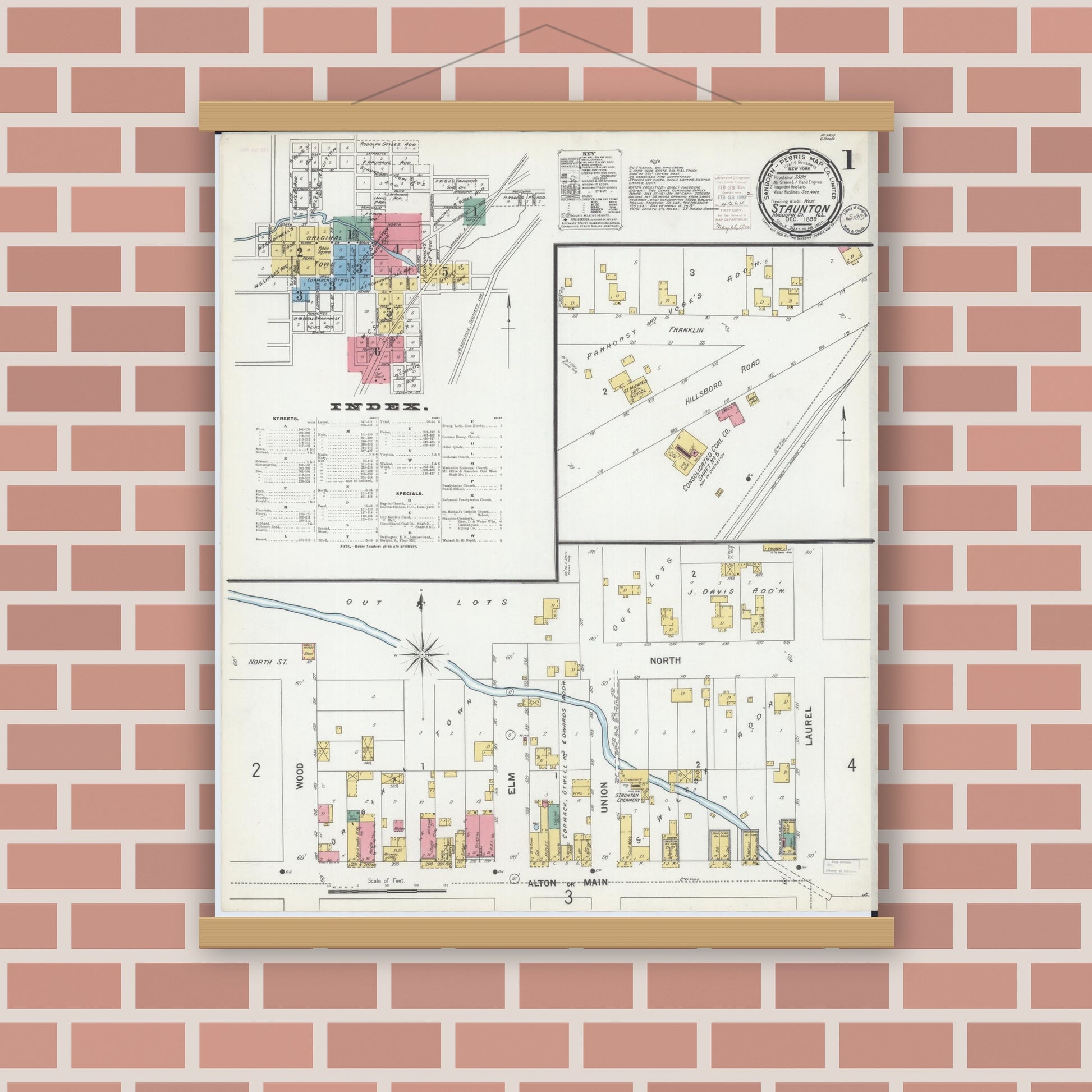 Old map wall art mockup — magnetic wood frame on brick wall — Sanborn Fire Insurance Map from Staunton, Macoupin County, Illinois (1899), Sheet #0001