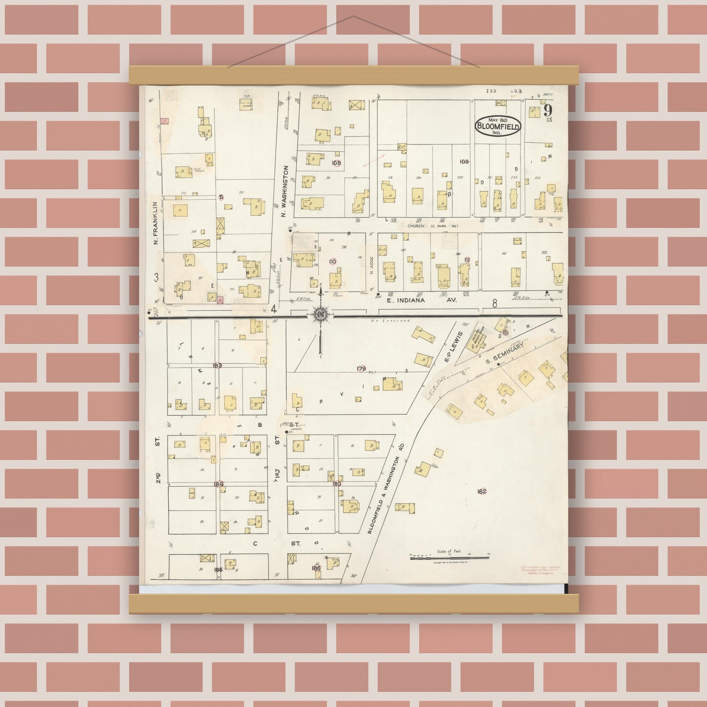 Old map wall art mockup — magnetic wood frame on brick wall — Sanborn Fire Insurance Map from Bloomfield, Greene County, Indiana (1940), Sheet #0009