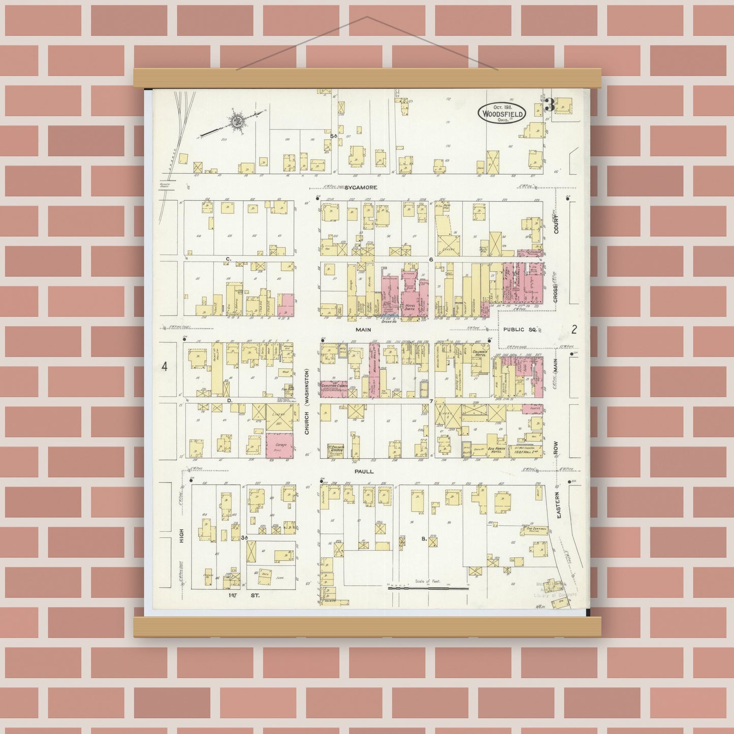 Old map wall art mockup — magnetic wood frame on brick wall — Sanborn Fire Insurance Map from Woodsfield, Monroe County, Ohio (1911), Sheet #0003