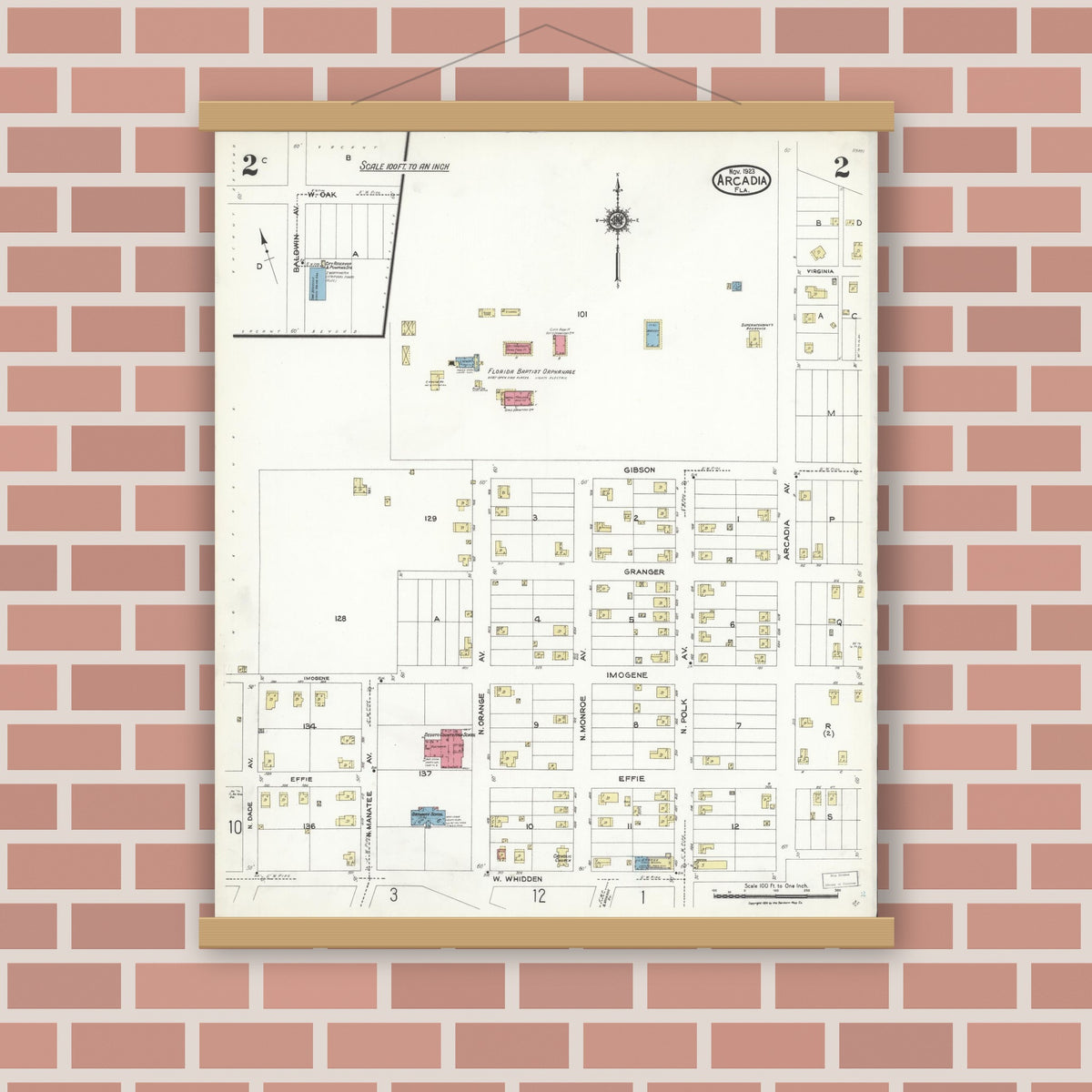 Old map wall art mockup — magnetic wood frame on brick wall — Sanborn Fire Insurance Map from Arcadia, DeSoto County, Florida (1923), Sheet #0002