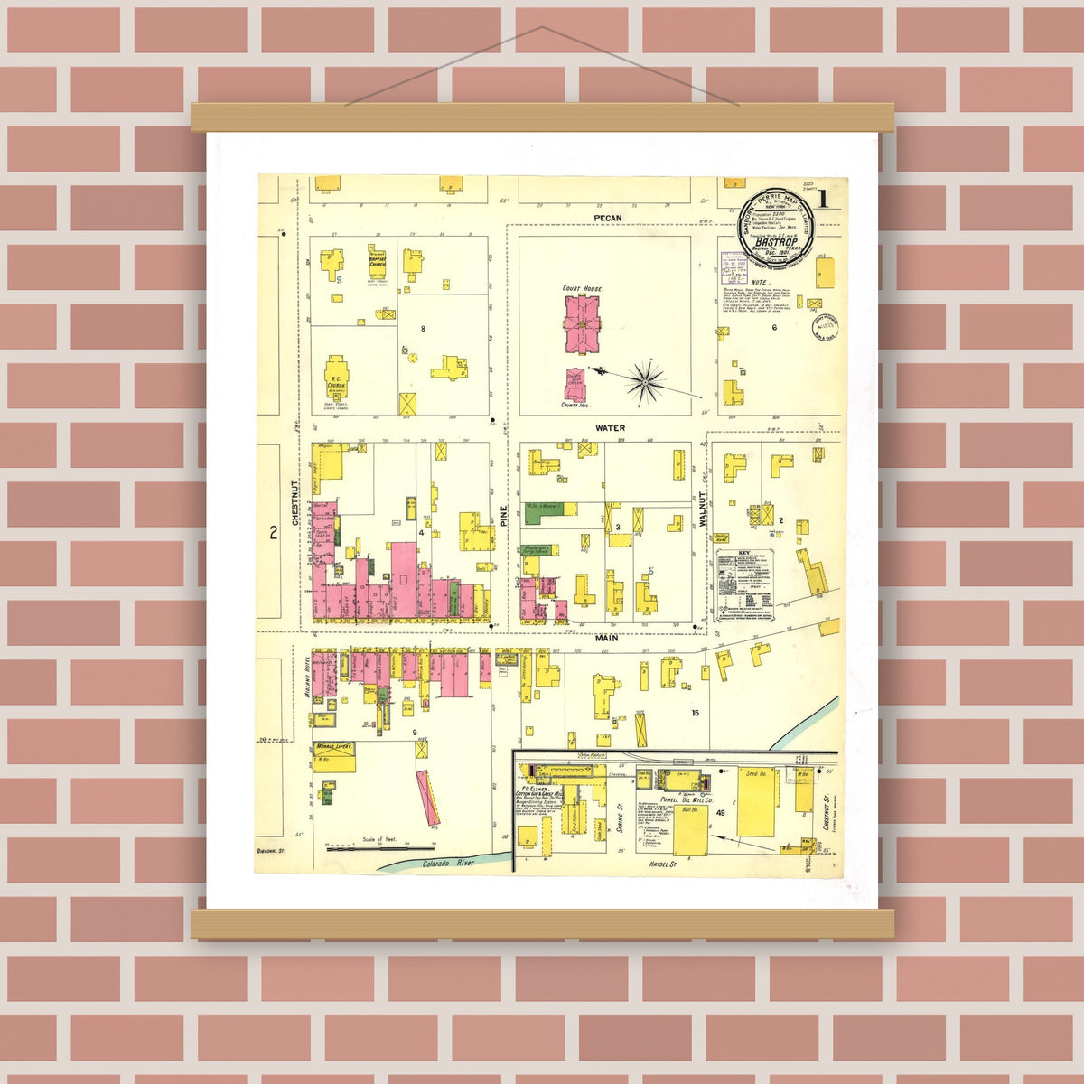 Old map wall art mockup — magnetic wood frame on brick wall — Sanborn Fire Insurance Map from Bastrop, Bastrop County, Texas (1901), Sheet #0001