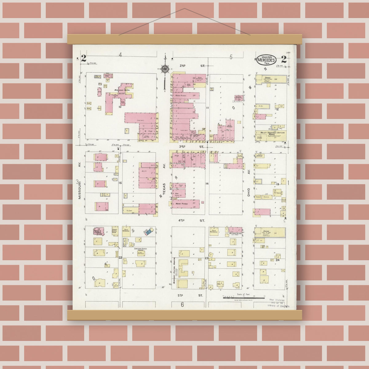 Old map wall art mockup — magnetic wood frame on brick wall — Sanborn Fire Insurance Map from Mercedes, Hidalgo County, Texas (1925), Sheet #0002