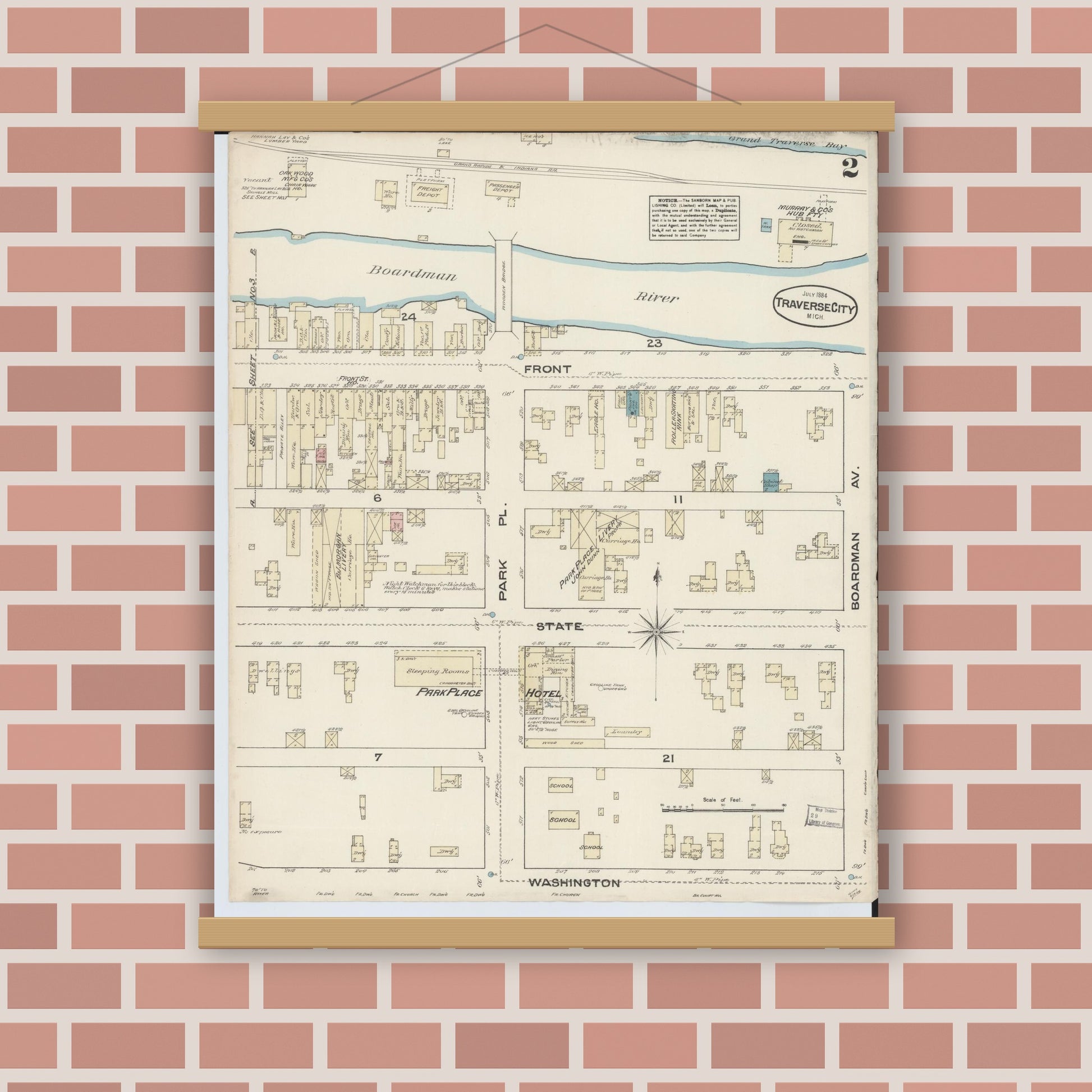 Old map wall art mockup — magnetic wood frame on brick wall — Sanborn Fire Insurance Map from Traverse City, Grand Traverse County, Michigan (1884), Sheet #0002