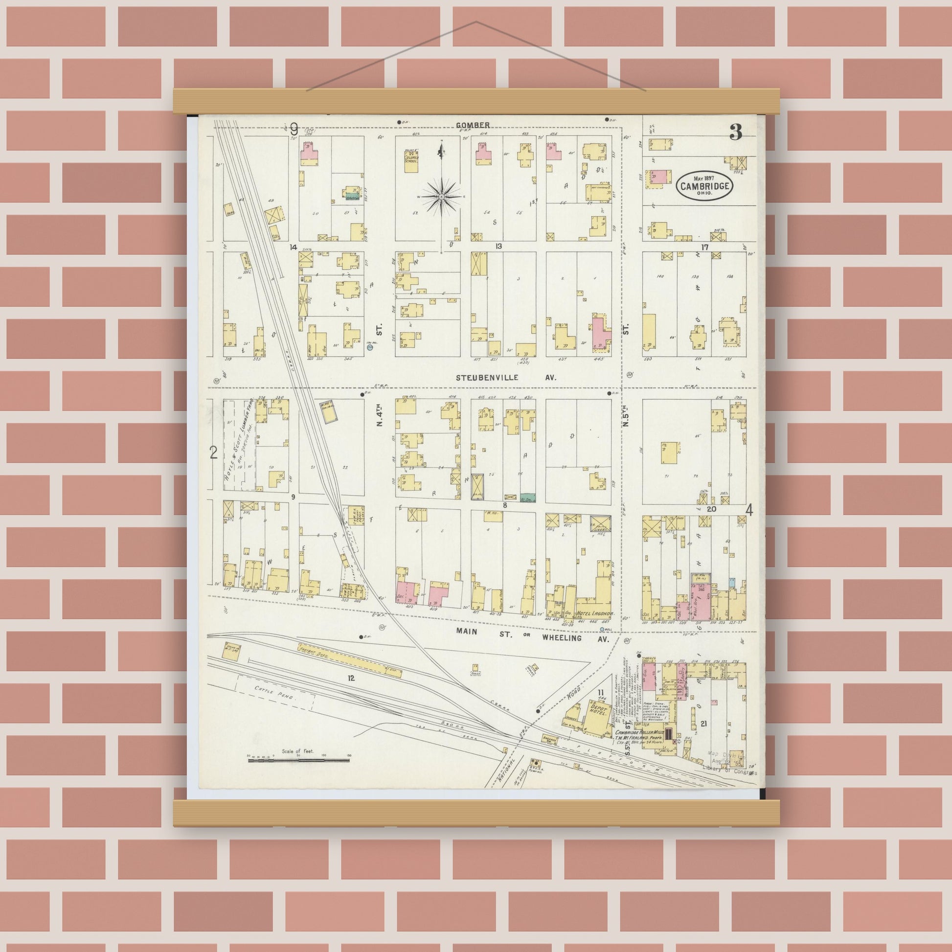 Old map wall art mockup — magnetic wood frame on brick wall — Sanborn Fire Insurance Map from Cambridge, Guernsey County, Ohio (1897), Sheet #0003