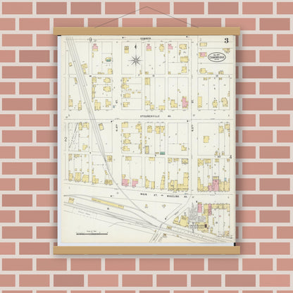 Old map wall art mockup — magnetic wood frame on brick wall — Sanborn Fire Insurance Map from Cambridge, Guernsey County, Ohio (1897), Sheet #0003