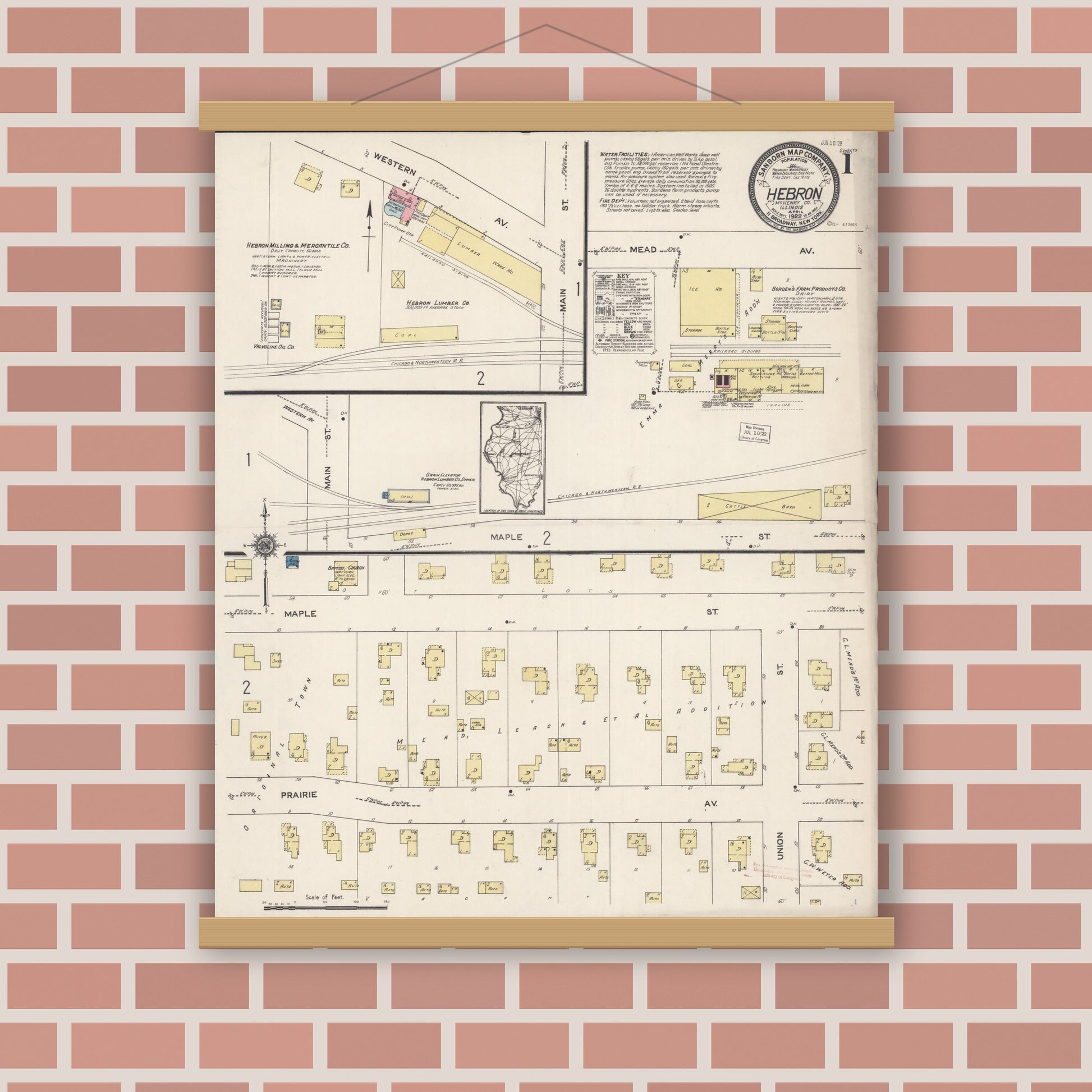 Old map wall art mockup — magnetic wood frame on brick wall — Sanborn Fire Insurance Map from Hebron, McHenry County, Illinois (1922), Sheet #0001