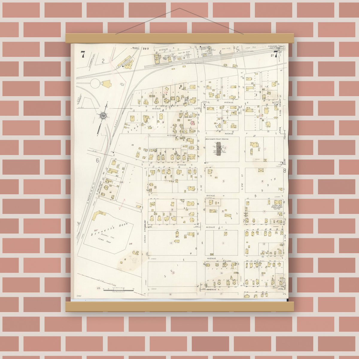 Old map wall art mockup — magnetic wood frame on brick wall — Sanborn Fire Insurance Map from Conroe, Montgomery County, Texas (1943), Sheet #0007