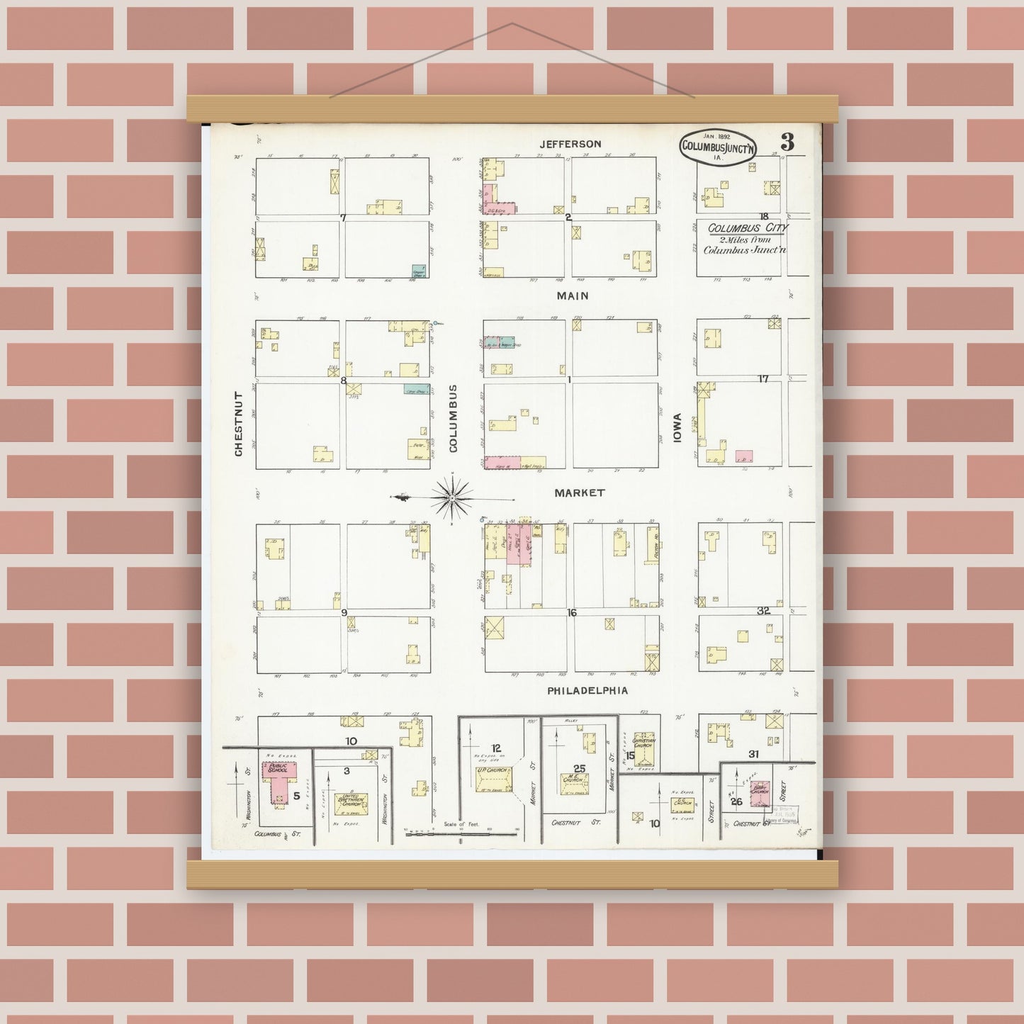 Old map wall art mockup — magnetic wood frame on brick wall — Sanborn Fire Insurance Map from Columbus Junction, Louisa County, Iowa (1892), Sheet #0003