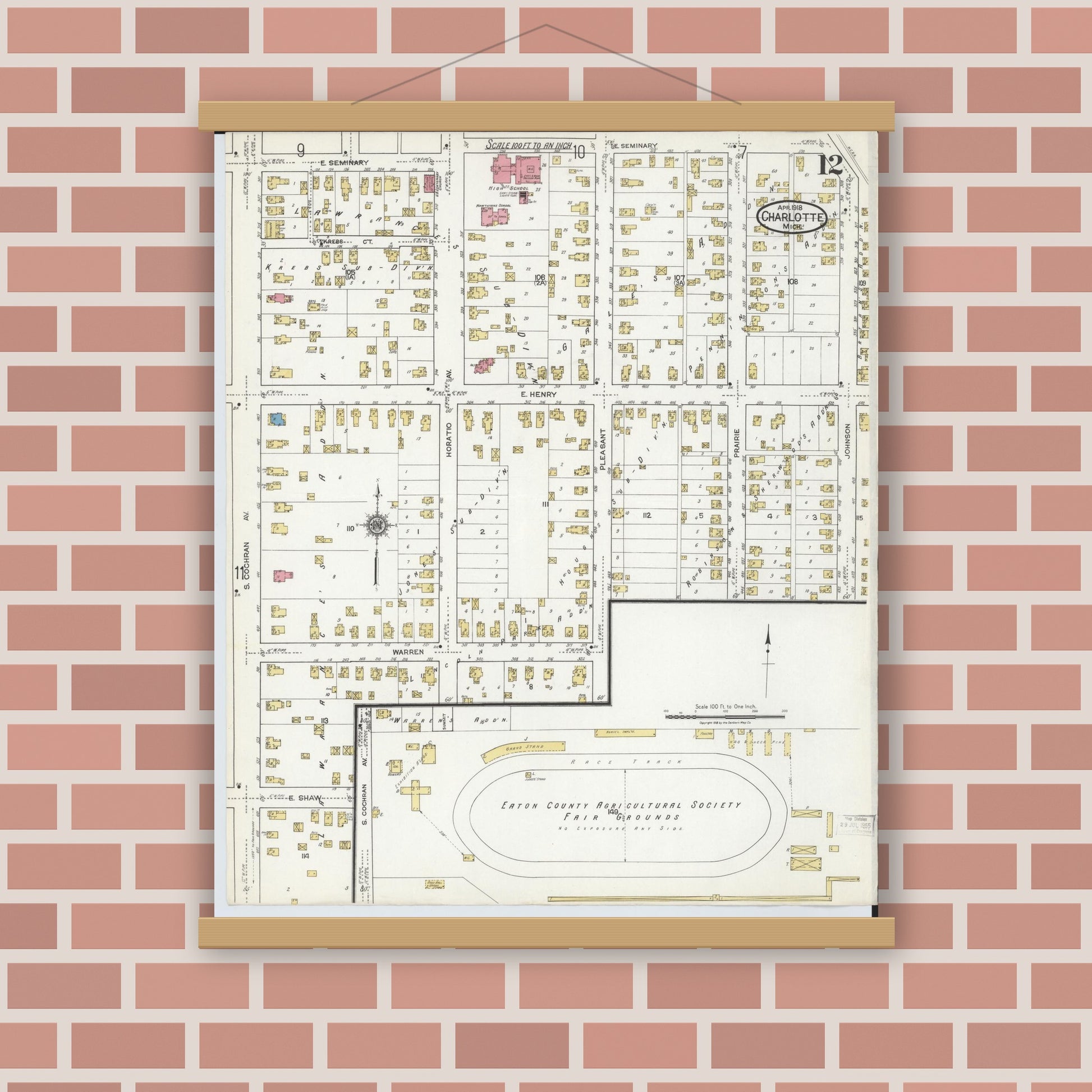 Old map wall art mockup — magnetic wood frame on brick wall — Sanborn Fire Insurance Map from Charlotte, Eaton County, Michigan (1918), Sheet #0012