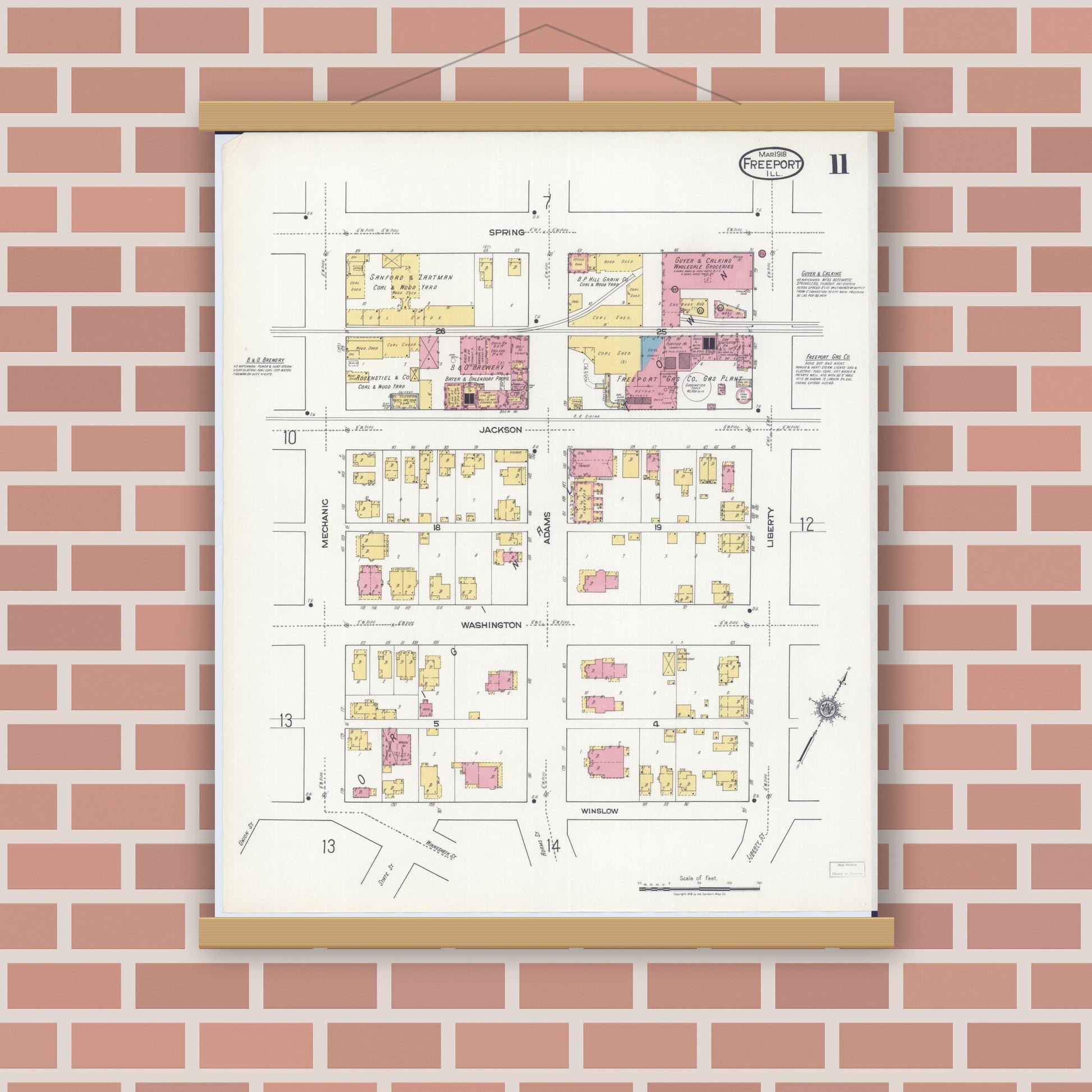 Old map wall art mockup — magnetic wood frame on brick wall — Sanborn Fire Insurance Map from Freeport, Stephenson County, Illinois (1918), Sheet #0011