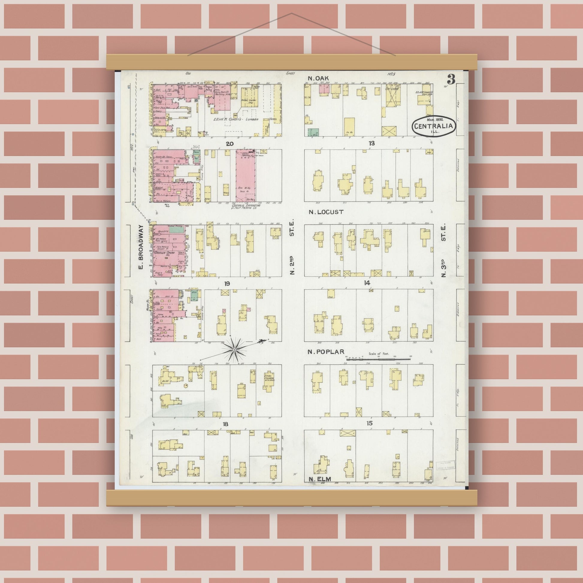 Old map wall art mockup — magnetic wood frame on brick wall — Sanborn Fire Insurance Map from Centralia, Marion, Clinton, Jefferson, and Washington Counties, Illinois (1892), Sheet #0003