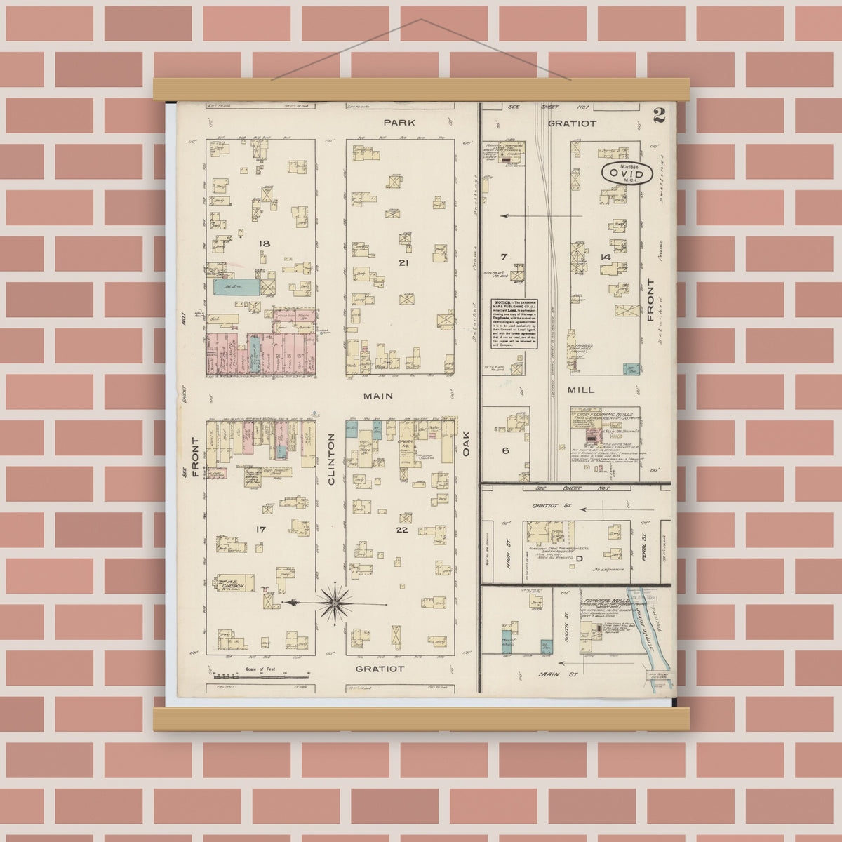 Old map wall art mockup — magnetic wood frame on brick wall — Sanborn Fire Insurance Map from Ovid, Clinton County, Michigan (1884), Sheet #0002