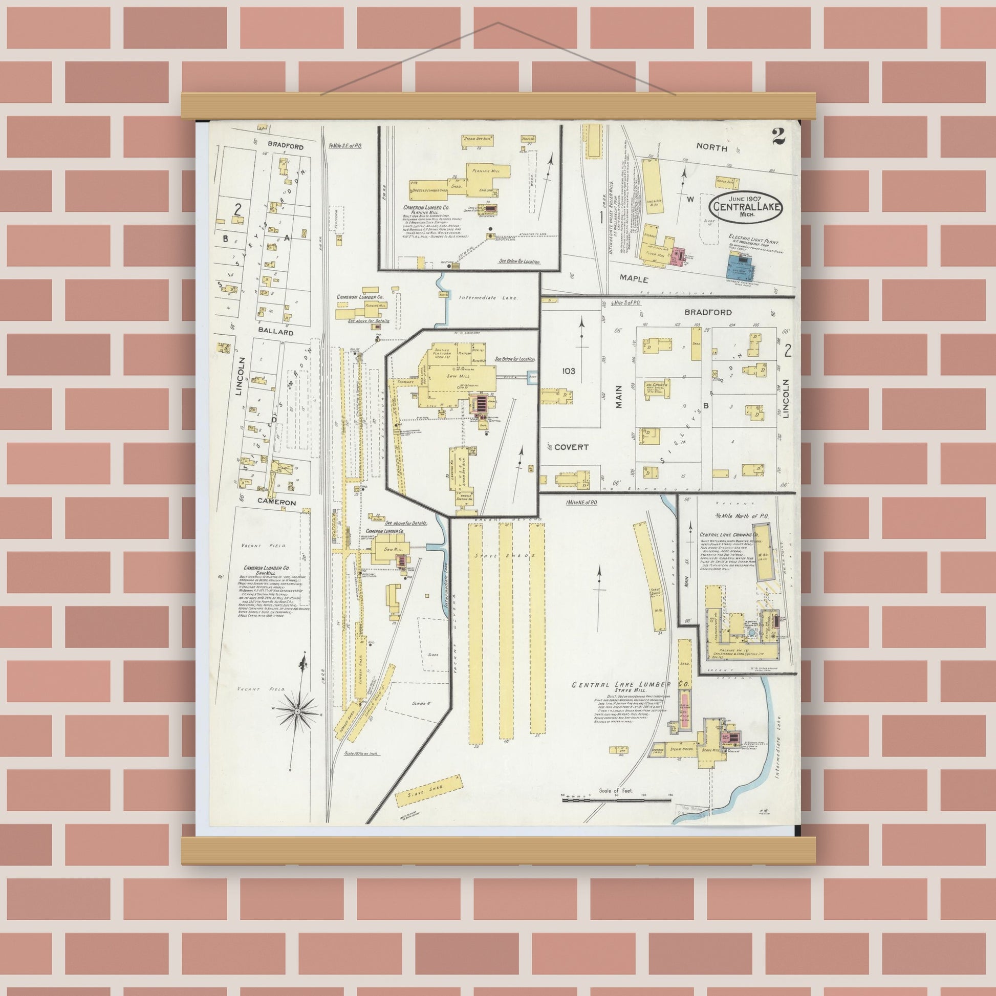 Old map wall art mockup — magnetic wood frame on brick wall — Sanborn Fire Insurance Map from Central Lake, Antrim County, Michigan (1907), Sheet #0002