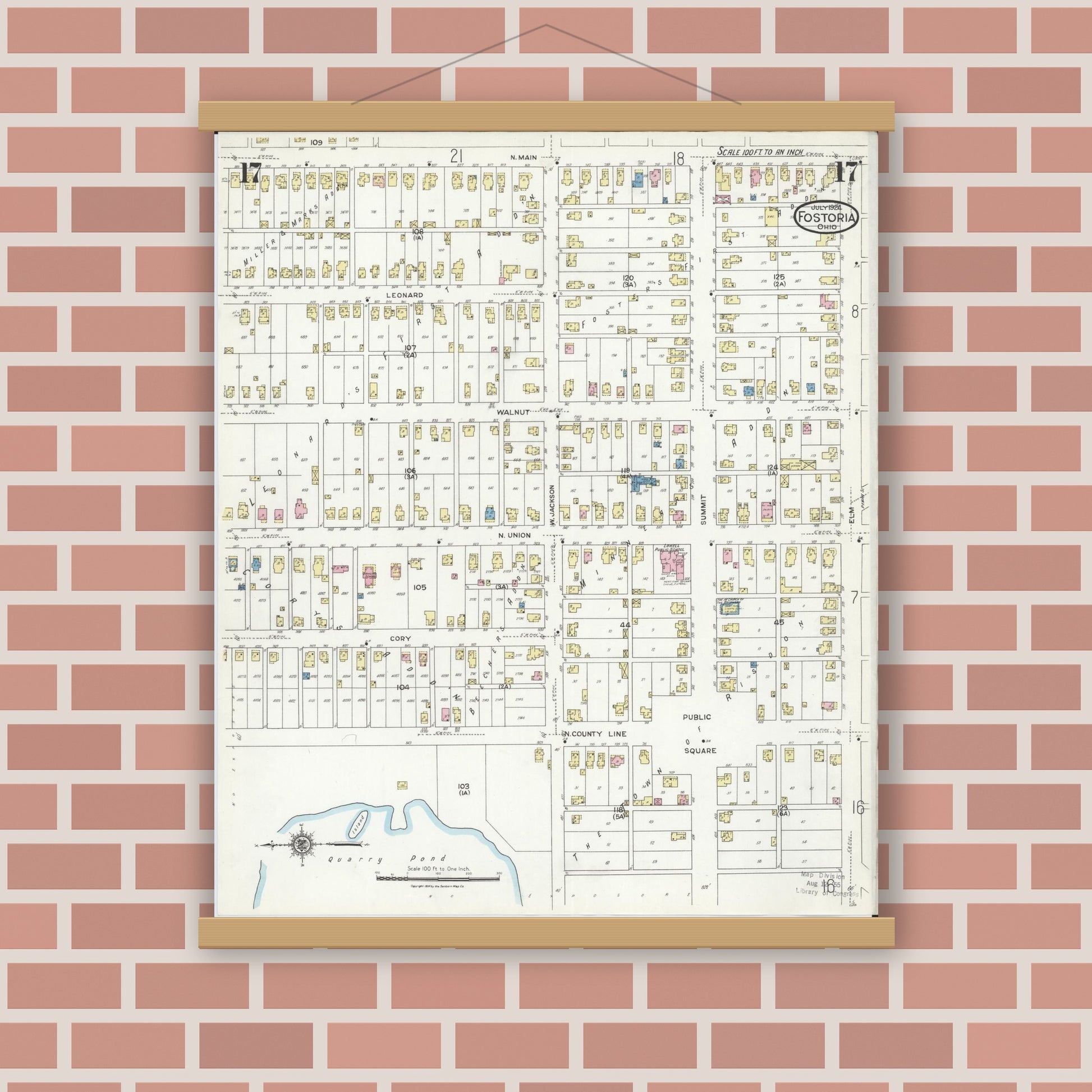 Old map wall art mockup — magnetic wood frame on brick wall — Sanborn Fire Insurance Map from Fostoria, Seneca, Hancock, And Wood Counties, Ohio (1924), Sheet #0017