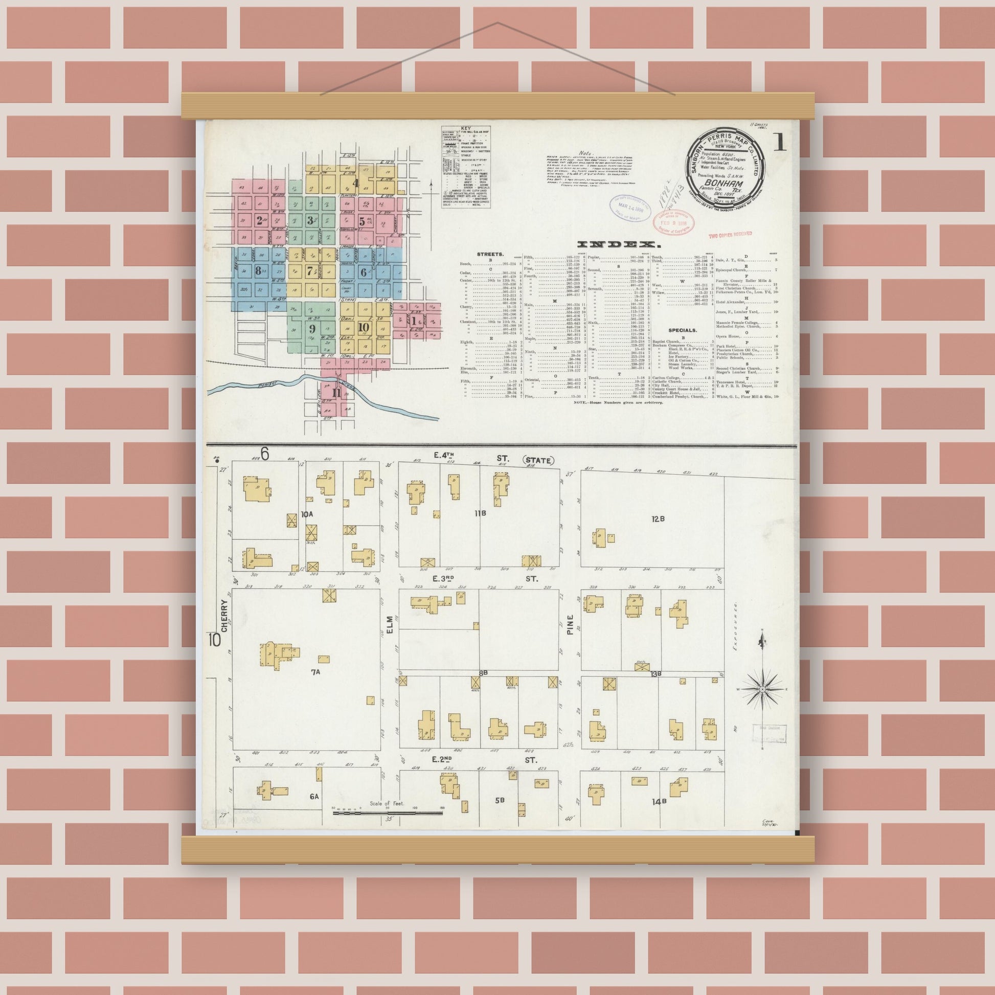 Old map wall art mockup — magnetic wood frame on brick wall — Sanborn Fire Insurance Map from Bonham, Fannin County, Texas (1897), Sheet #0001
