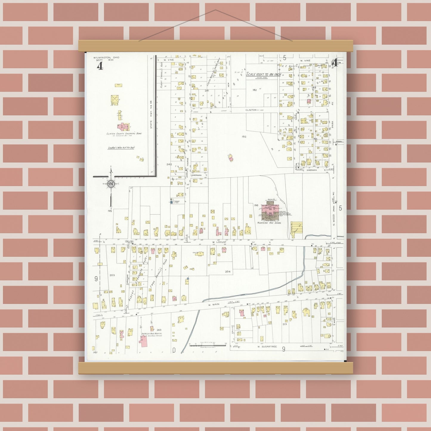 Old map wall art mockup — magnetic wood frame on brick wall — Sanborn Fire Insurance Map from Wilmington, Clinton County, Ohio (1933), Sheet #0004