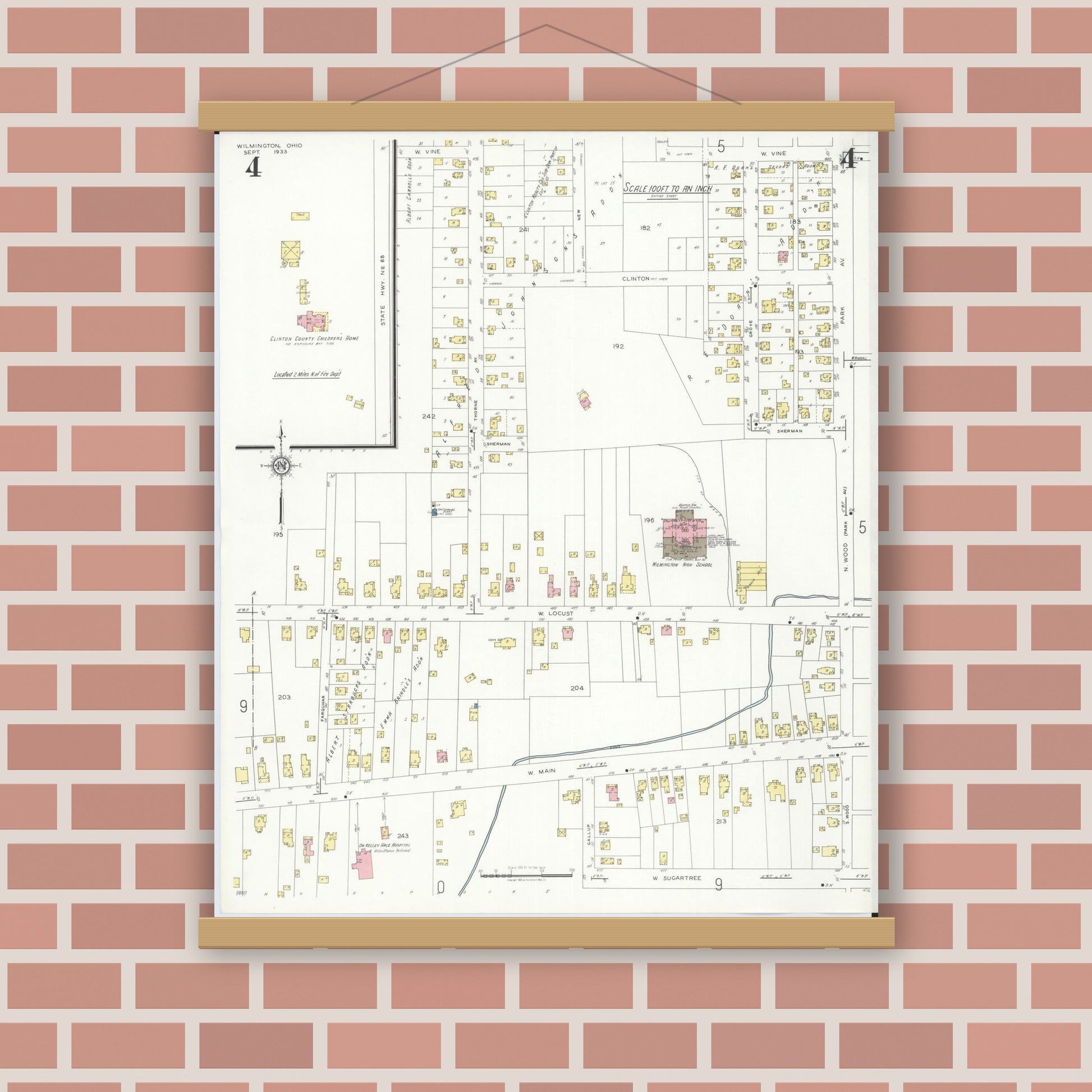 Old map wall art mockup — magnetic wood frame on brick wall — Sanborn Fire Insurance Map from Wilmington, Clinton County, Ohio (1933), Sheet #0004
