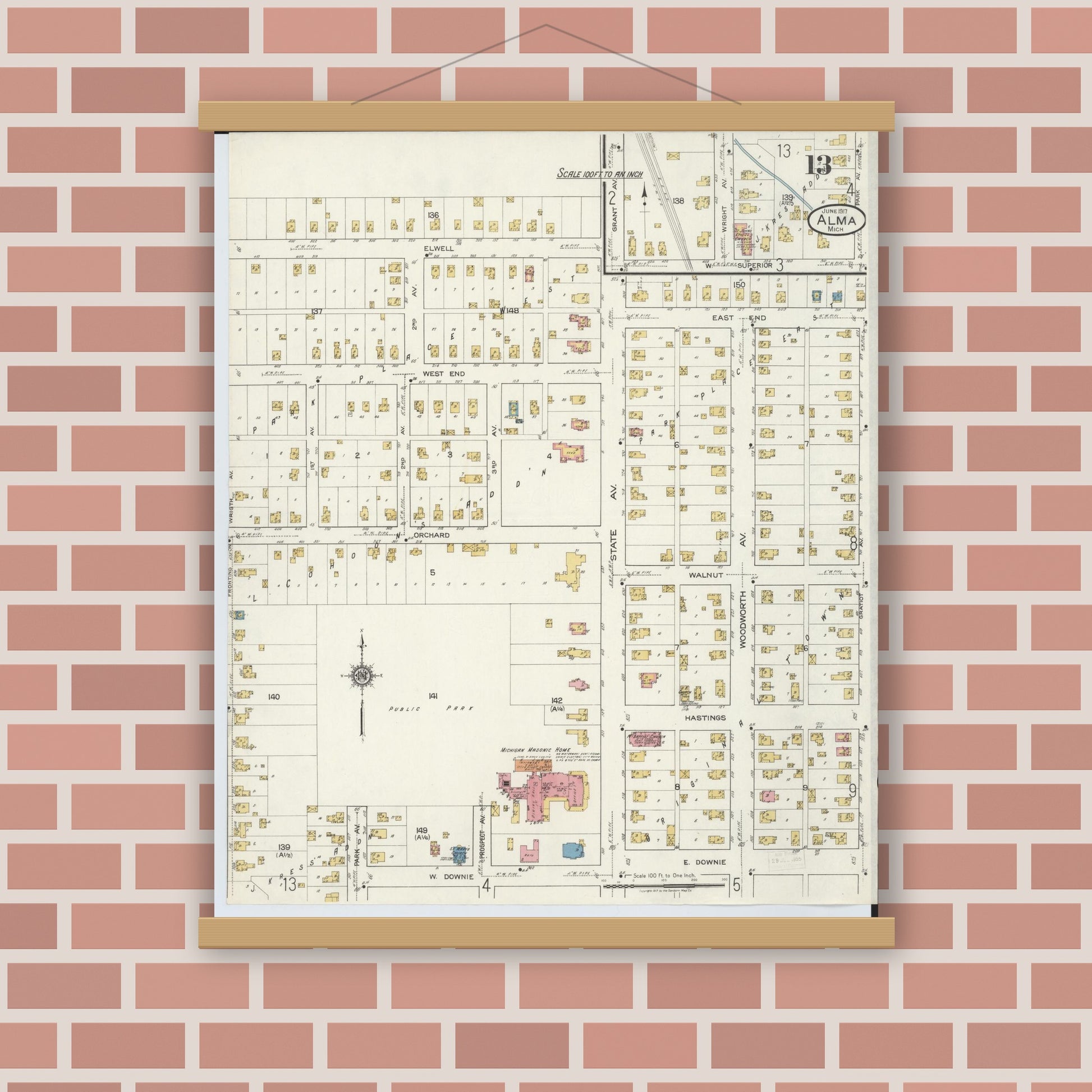 Old map wall art mockup — magnetic wood frame on brick wall — Sanborn Fire Insurance Map from Alma, Gratiot County, Michigan (1917), Sheet #0013