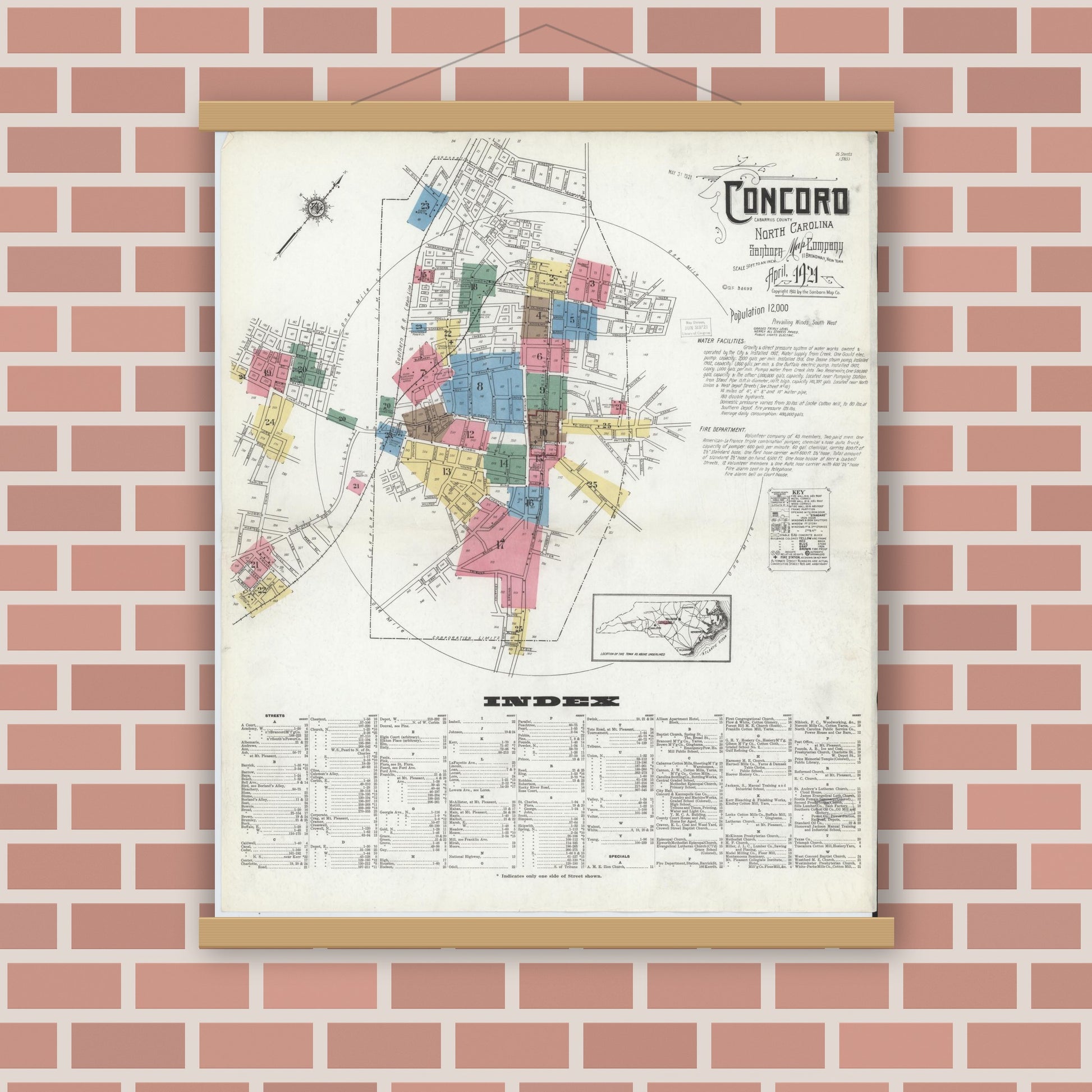 Old map wall art mockup — magnetic wood frame on brick wall — Sanborn Fire Insurance Map from Concord, Cabarrus County, North Carolina (1921), Sheet #0001
