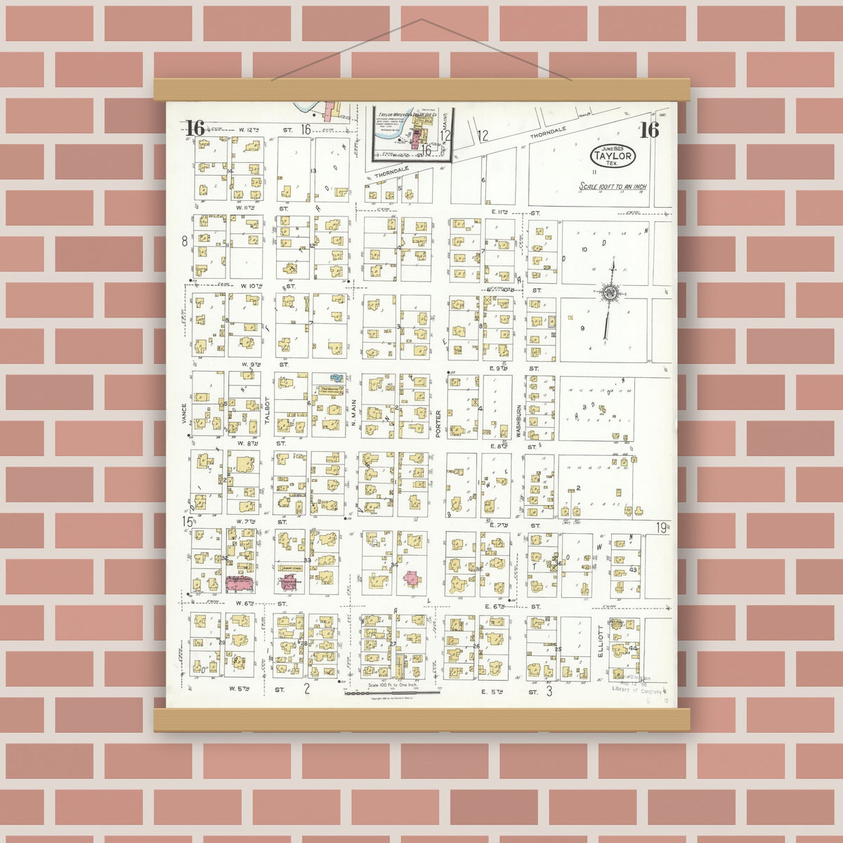 Old map wall art mockup — magnetic wood frame on brick wall — Sanborn Fire Insurance Map from Taylor, Williamson County, Texas (1923), Sheet #0016