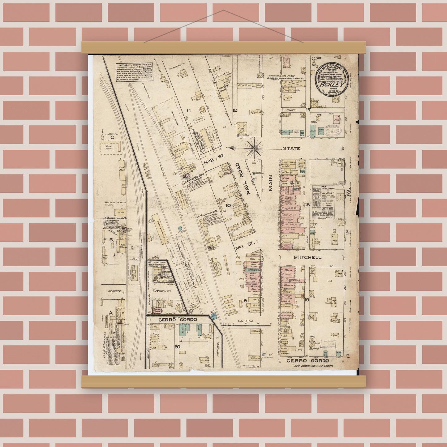Old map wall art mockup — magnetic wood frame on brick wall — Sanborn Fire Insurance Map from Ackley, Hardin and Franklin Counties, Iowa (1883), Sheet #0001
