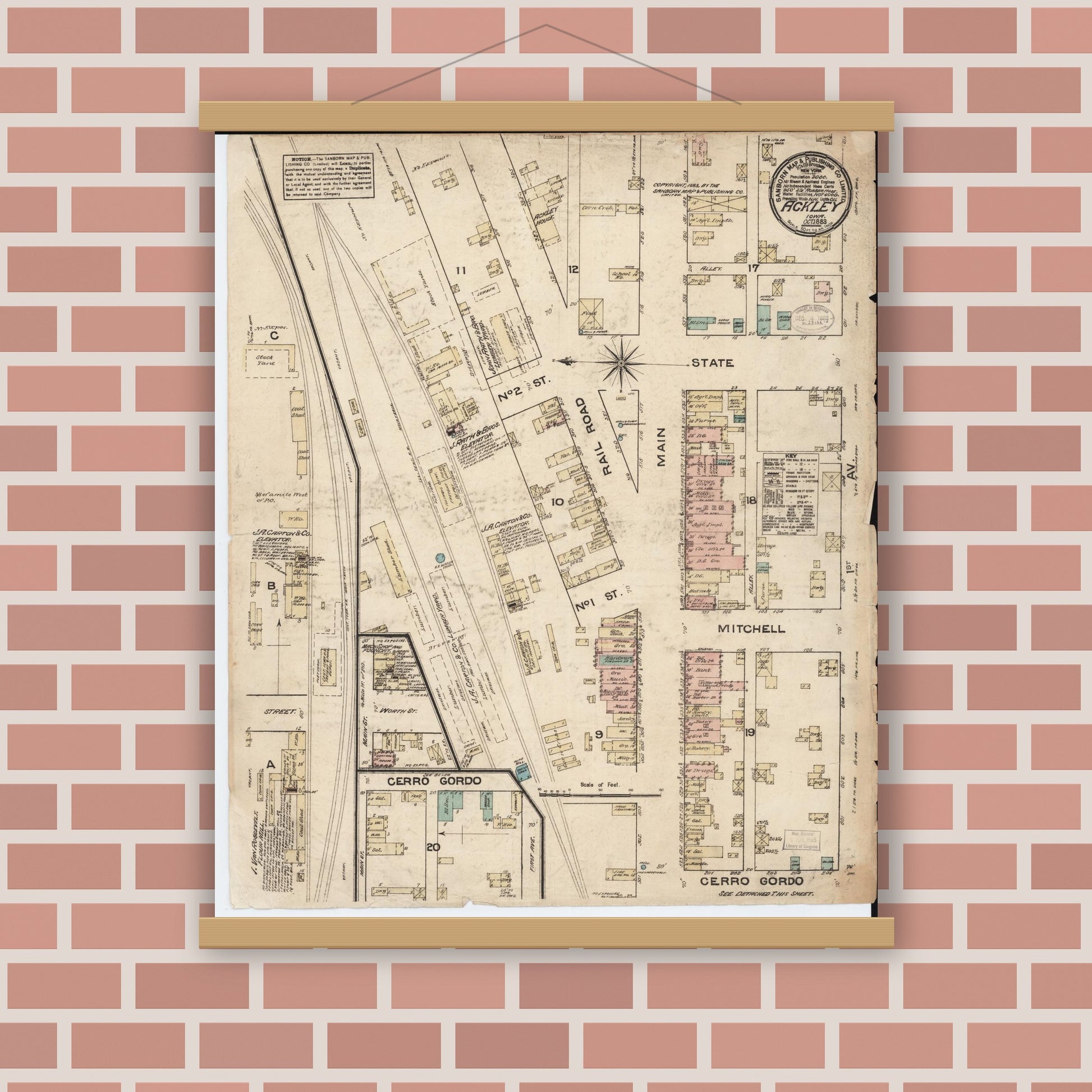 Old map wall art mockup — magnetic wood frame on brick wall — Sanborn Fire Insurance Map from Ackley, Hardin and Franklin Counties, Iowa (1883), Sheet #0001