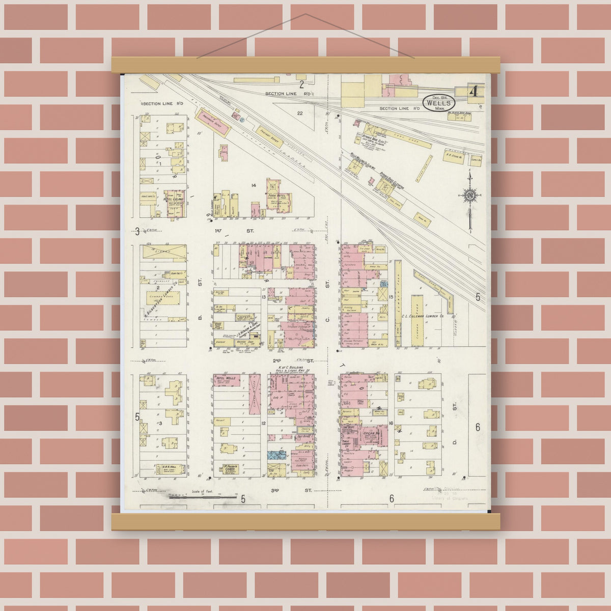 Old map wall art mockup — magnetic wood frame on brick wall — Sanborn Fire Insurance Map from Wells, Faribault County, Minnesota (1914), Sheet #0004