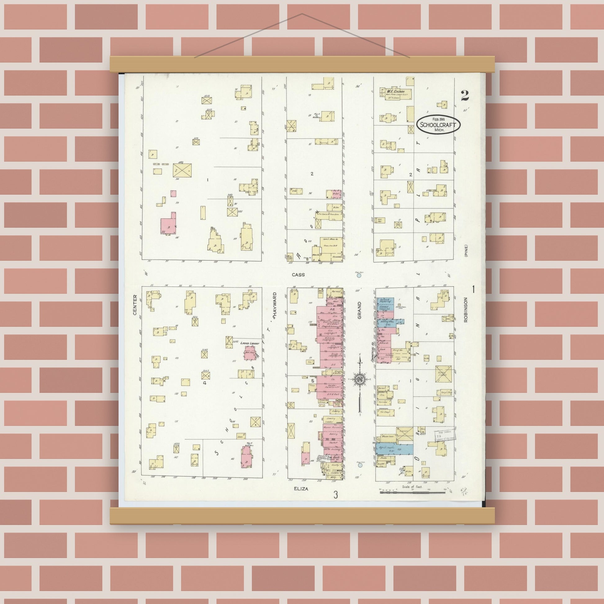 Old map wall art mockup — magnetic wood frame on brick wall — Sanborn Fire Insurance Map from Schoolcraft, Kalamazoo County, Michigan (1914), Sheet #0002