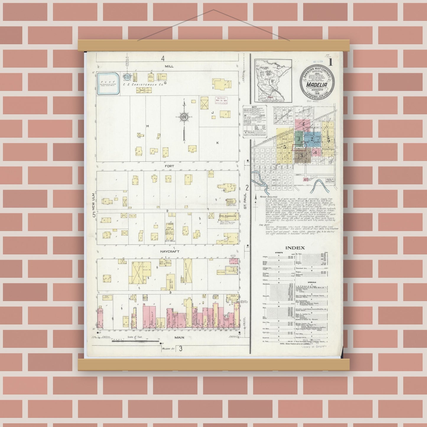 Old map wall art mockup — magnetic wood frame on brick wall — Sanborn Fire Insurance Map from Madelia, Watonwan County, Minnesota (1914) - Complete Map Set