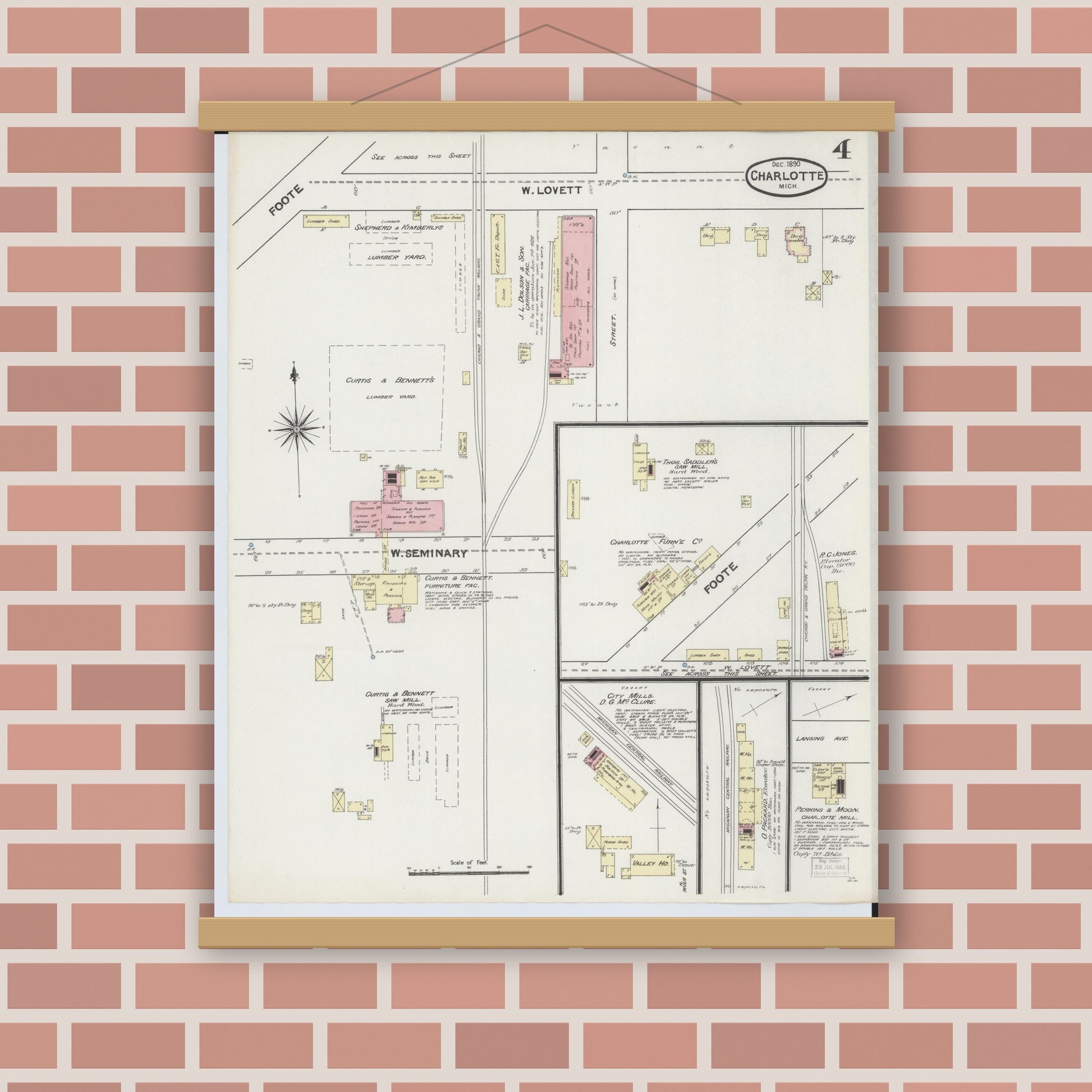 Old map wall art mockup — magnetic wood frame on brick wall — Sanborn Fire Insurance Map from Charlotte, Eaton County, Michigan (1890), Sheet #0004