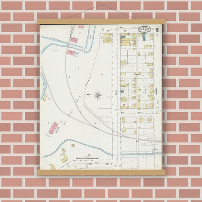 Old map wall art mockup — magnetic wood frame on brick wall — Sanborn Fire Insurance Map from De Pere, Brown County, Wisconsin (1895), Sheet #0002
