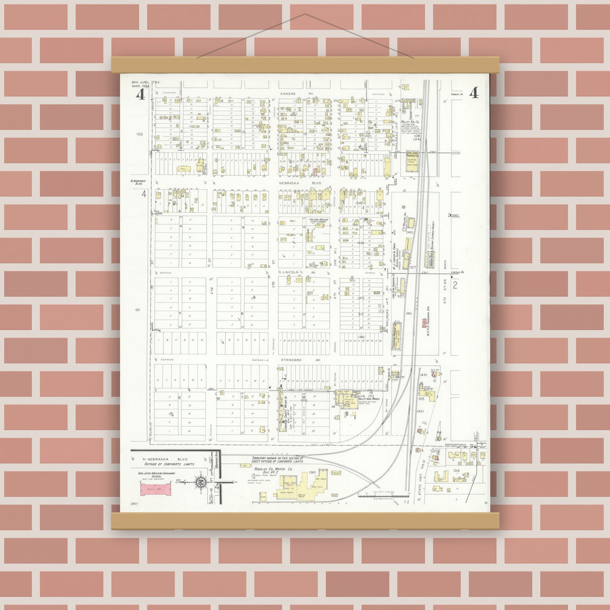 Old map wall art mockup — magnetic wood frame on brick wall — Sanborn Fire Insurance Map from San Juan, Hidalgo County, Texas (1938), Sheet #0004