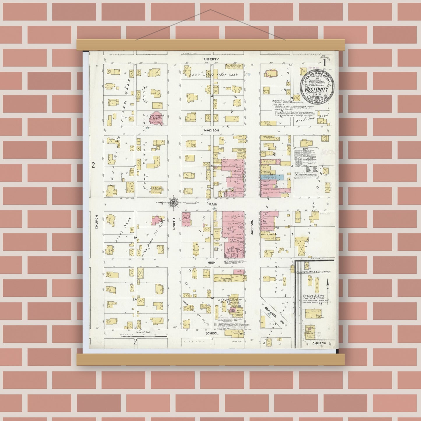 Old map wall art mockup — magnetic wood frame on brick wall — Sanborn Fire Insurance Map from West Unity, Williams County, Ohio (1910), Sheet #0001