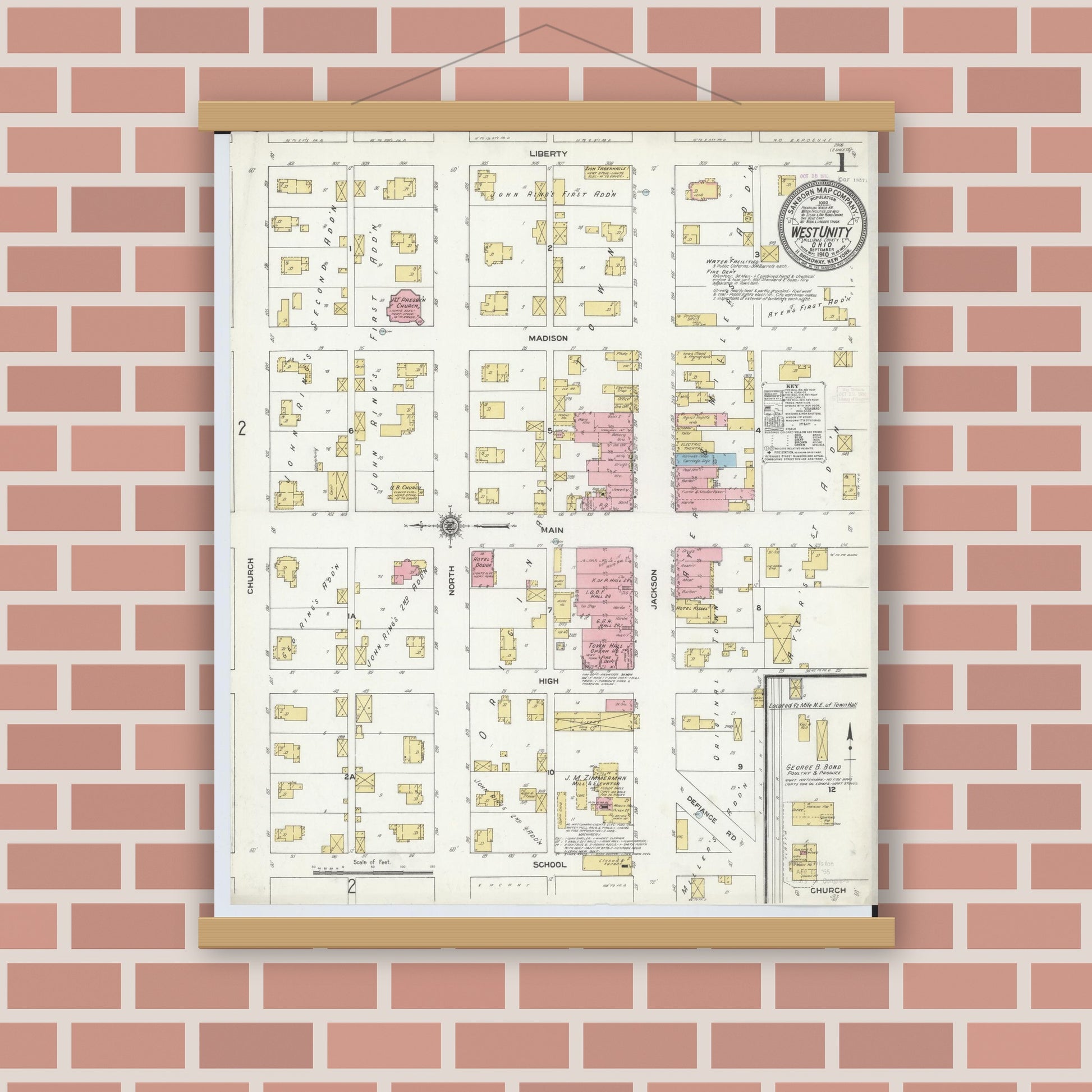 Old map wall art mockup — magnetic wood frame on brick wall — Sanborn Fire Insurance Map from West Unity, Williams County, Ohio (1910), Sheet #0001