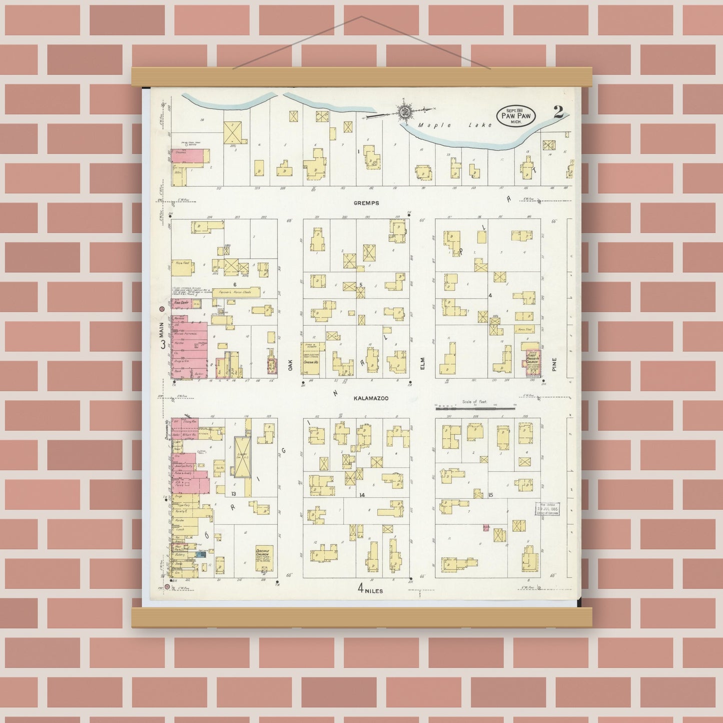 Old map wall art mockup — magnetic wood frame on brick wall — Sanborn Fire Insurance Map from Paw Paw, Van Buren County, Michigan (1911), Sheet #0002