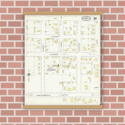 Old map wall art mockup — magnetic wood frame on brick wall — Sanborn Fire Insurance Map from Gainesville, Cooke County, Texas (1913), Sheet #0016