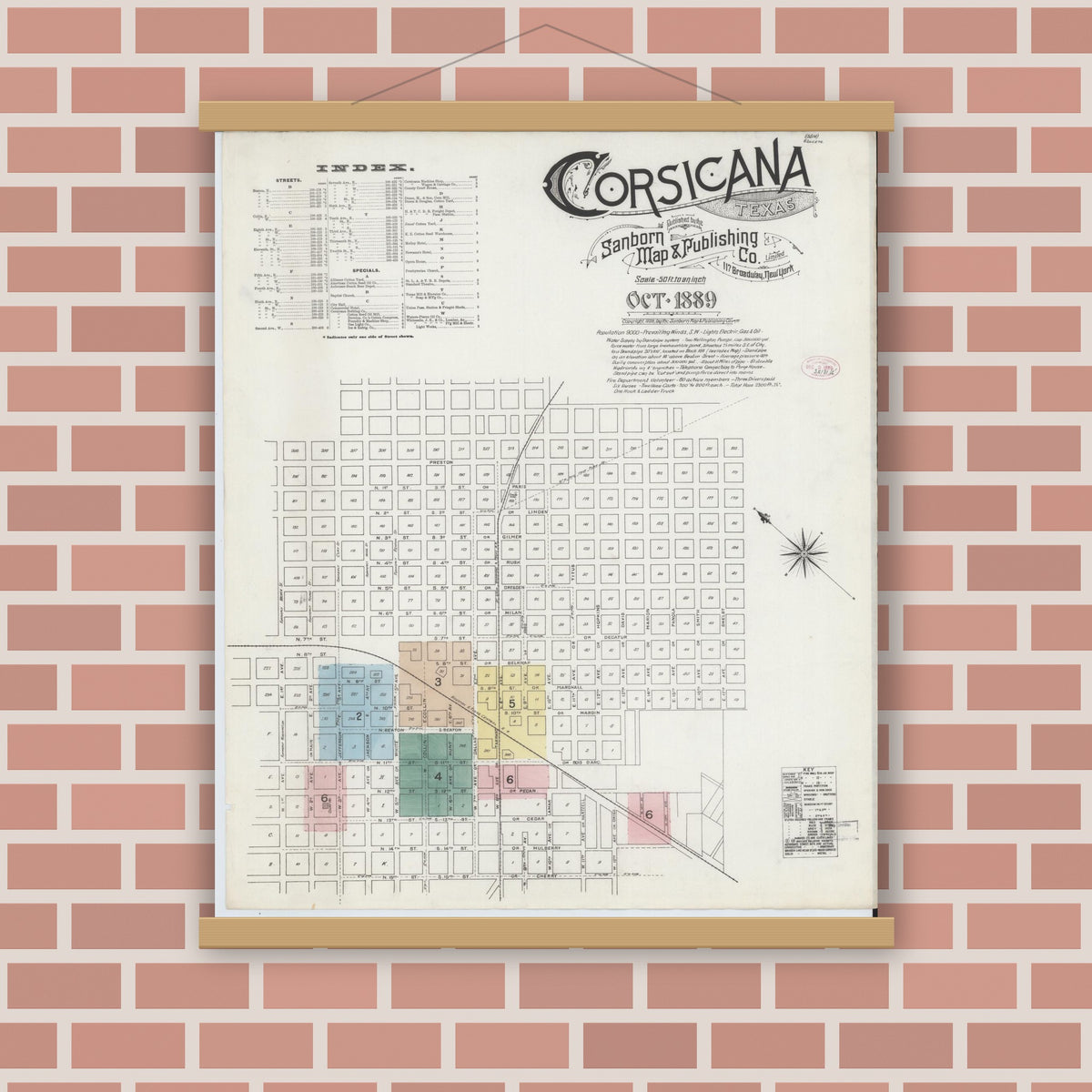 Old map wall art mockup — magnetic wood frame on brick wall — Sanborn Fire Insurance Map from Corsicana, Navarro County, Texas (1889), Sheet #0001