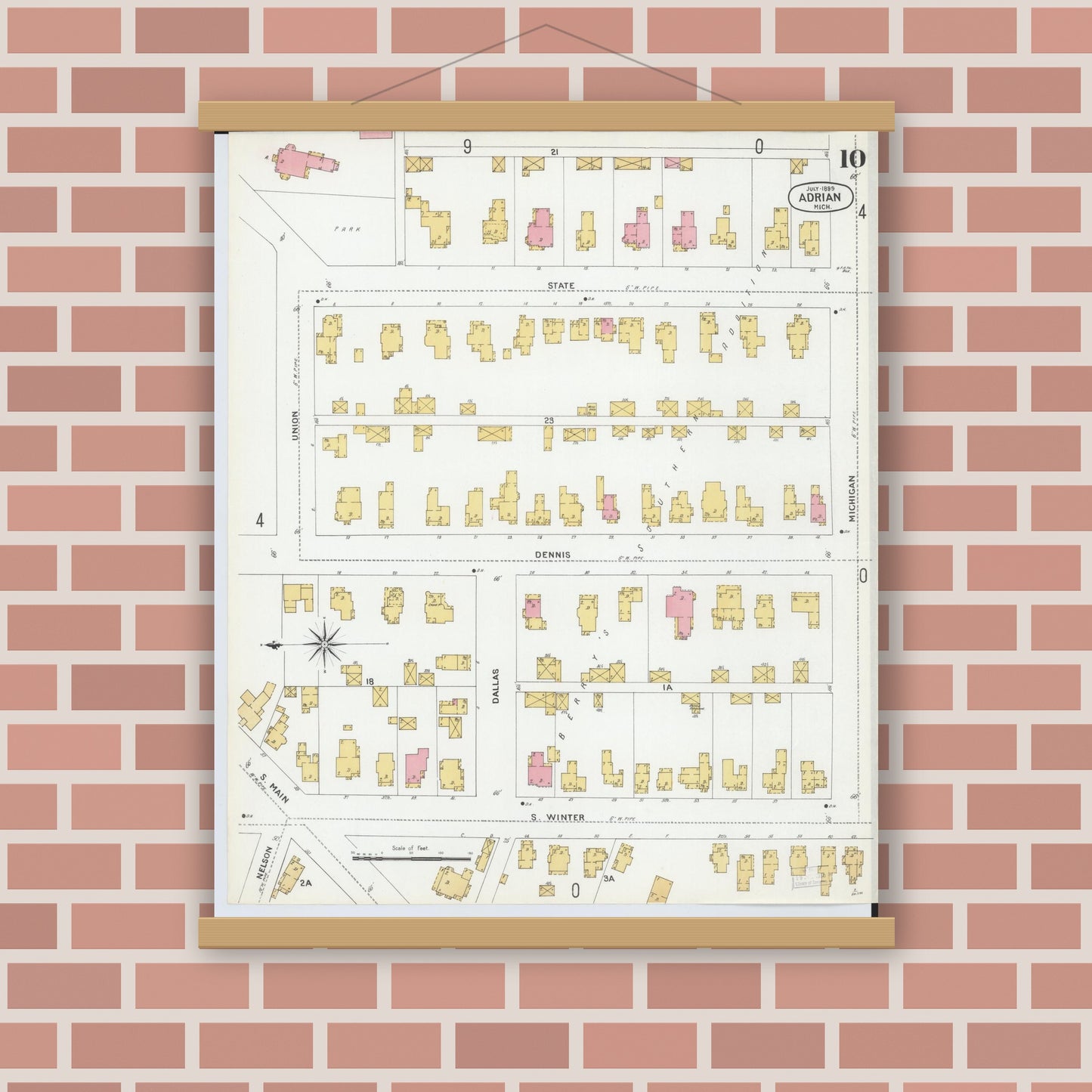 Old map wall art mockup — magnetic wood frame on brick wall — Sanborn Fire Insurance Map from Adrian, Lenawee County, Michigan (1899), Sheet #0010