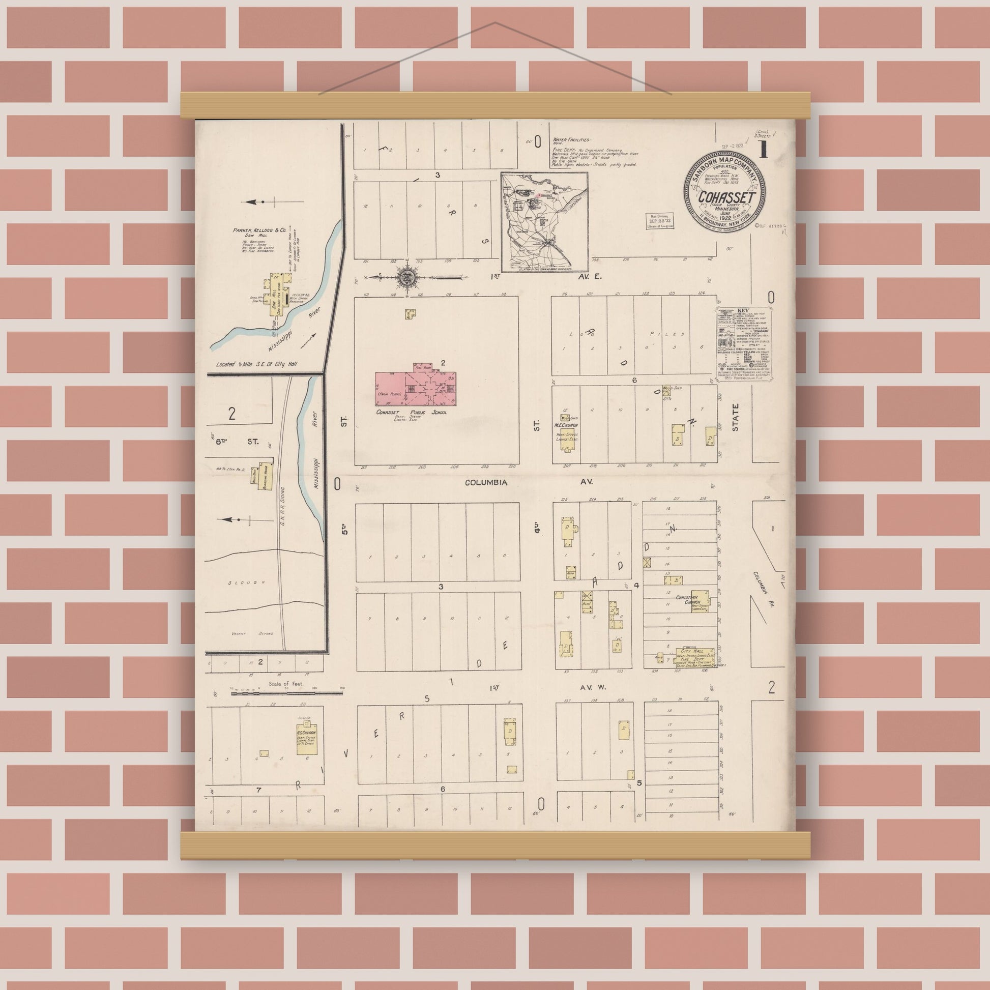Old map wall art mockup — magnetic wood frame on brick wall — Sanborn Fire Insurance Map from Cohasset, Itasca County, Minnesota (1922), Sheet #0001